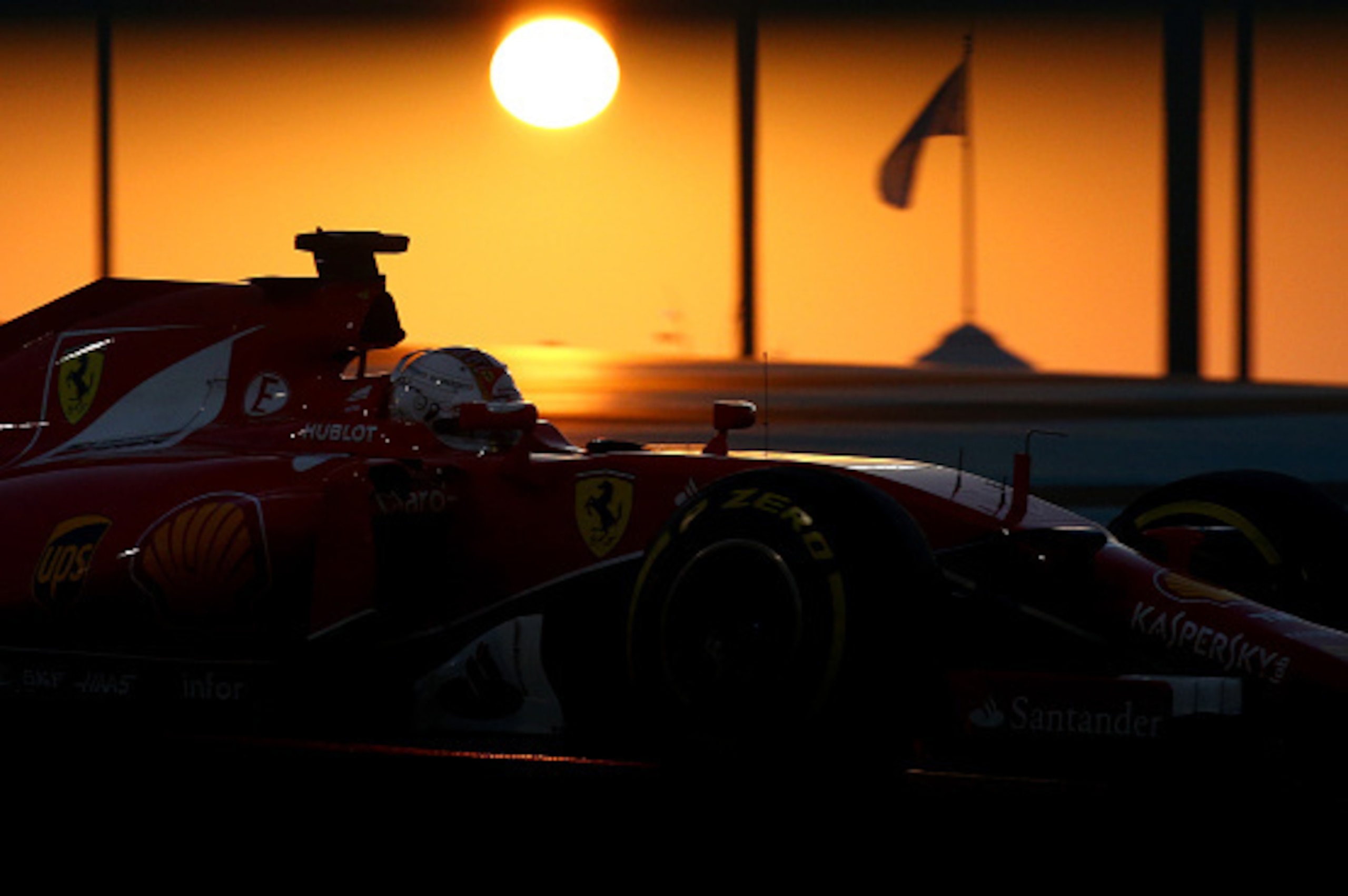 ABU DHABI, UNITED ARAB EMIRATES - NOVEMBER 29:  Sebastian Vettel of Germany and Ferrari drives during the Abu Dhabi Formula One Grand Prix at Yas Marina Circuit on November 29, 2015 in Abu Dhabi, United Arab Emirates.  (Photo by Paul Gilham/Getty Images)