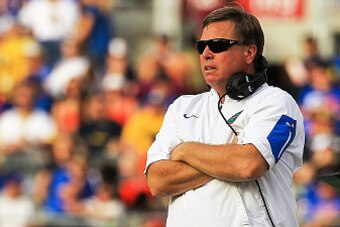 ORLANDO, FL - JANUARY 01:  Head coach Jim McElwain of the Florida Gators looks on during the Buffalo Wild Wings Citrus Bowl game against the Michigan Wolverines at Orlando Citrus Bowl on January 1, 2016 in Orlando, Florida.  (Photo by Rob Foldy/Getty Imag