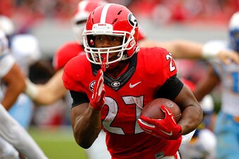 ATHENS, GA - SEPTEMBER 26: Running back Nick Chubb #27 of the Georgia Bulldogs rushes in for a touchdown in the third quarter of the game against the Southern University Jaguars on September 26, 2015 at Sanford Stadium in Athens, Georgia. The Georgia Bull