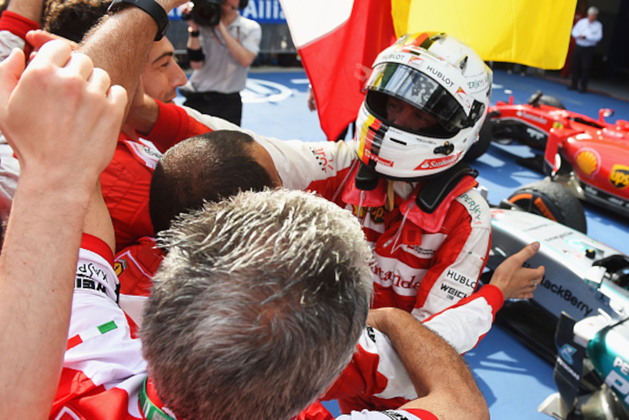 KUALA LUMPUR, MALAYSIA - MARCH 29:  Sebastian Vettel of Germany and Ferrari celebrates in Parc Ferme after winning the Malaysia Formula One Grand Prix at Sepang Circuit on March 29, 2015 in Kuala Lumpur, Malaysia.  (Photo by Lars Baron/Getty Images)