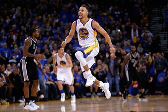 OAKLAND, CA - JANUARY 25:  Stephen Curry #30 of the Golden State Warriors reacts after he made a shot against the San Antonio Spurs in the third quarter at ORACLE Arena on January 25, 2016 in Oakland, California. NOTE TO USER: User expressly acknowledges 