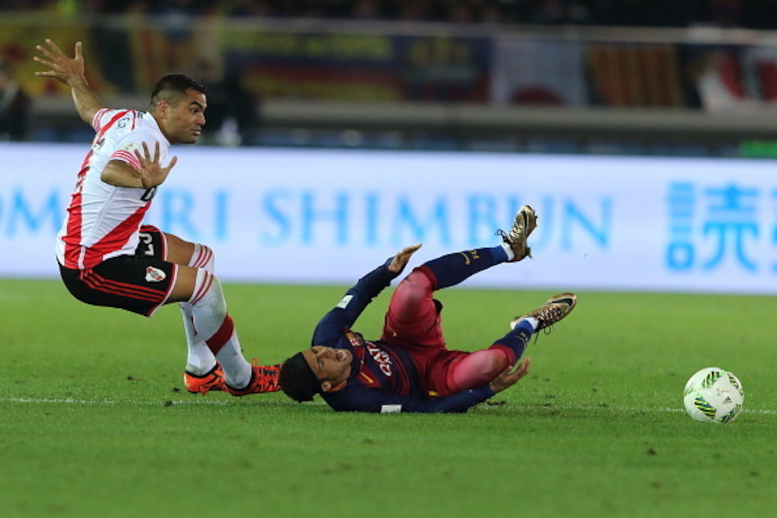 YOKOHAMA, JAPAN - DECEMBER 20:  Leonardo Pisculichi of River Plate fouls Neymar of FC Barcelona during the FIFA Club World Cup Final Match between FC Barcelona and River Plate at International Stadium Yokohama on December 20, 2015 in Yokohama, Japan.  (Ph