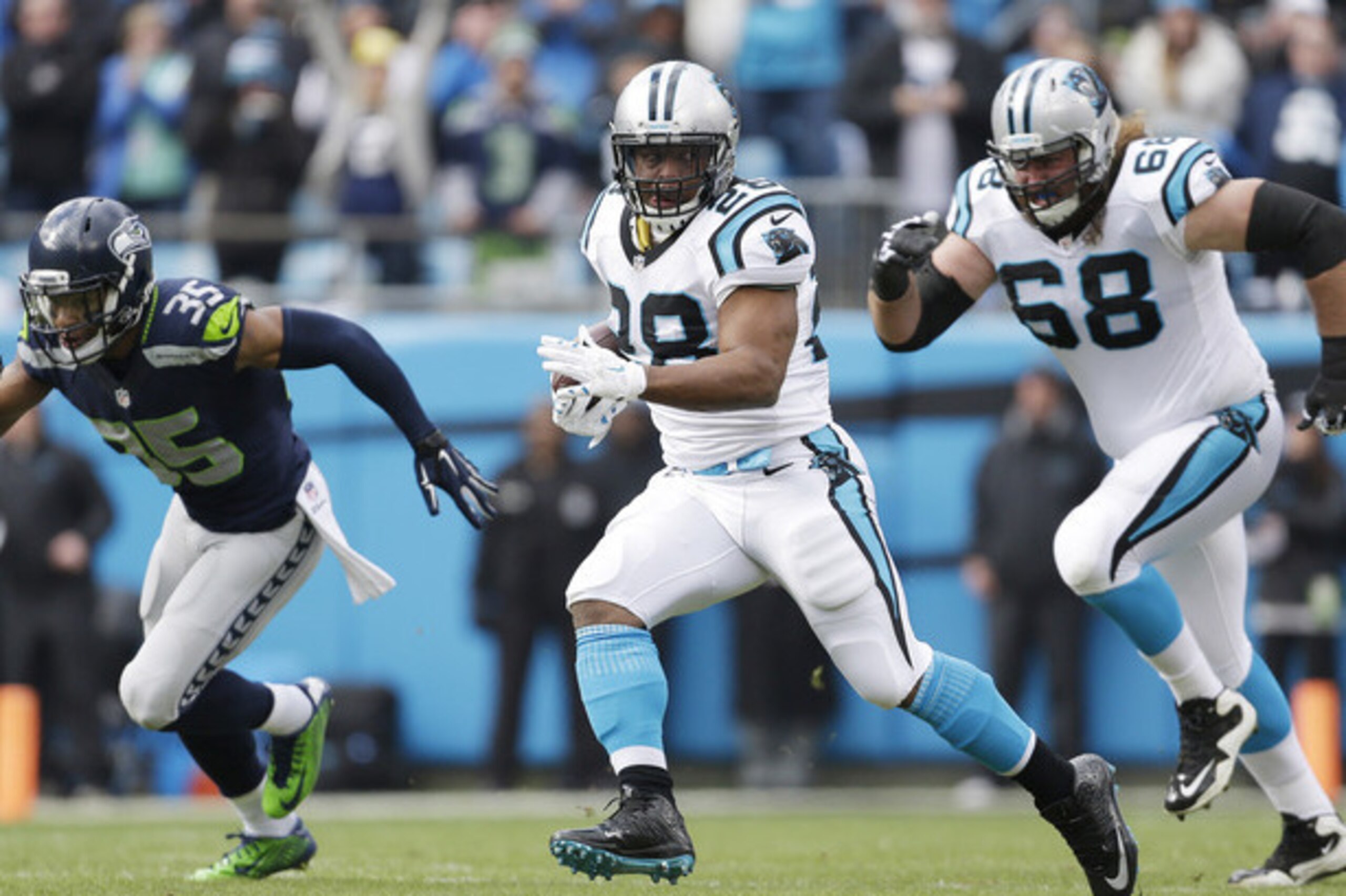 Jonathan Stewart helps take pressure off of Cam Newton, and Newton does the same for him.