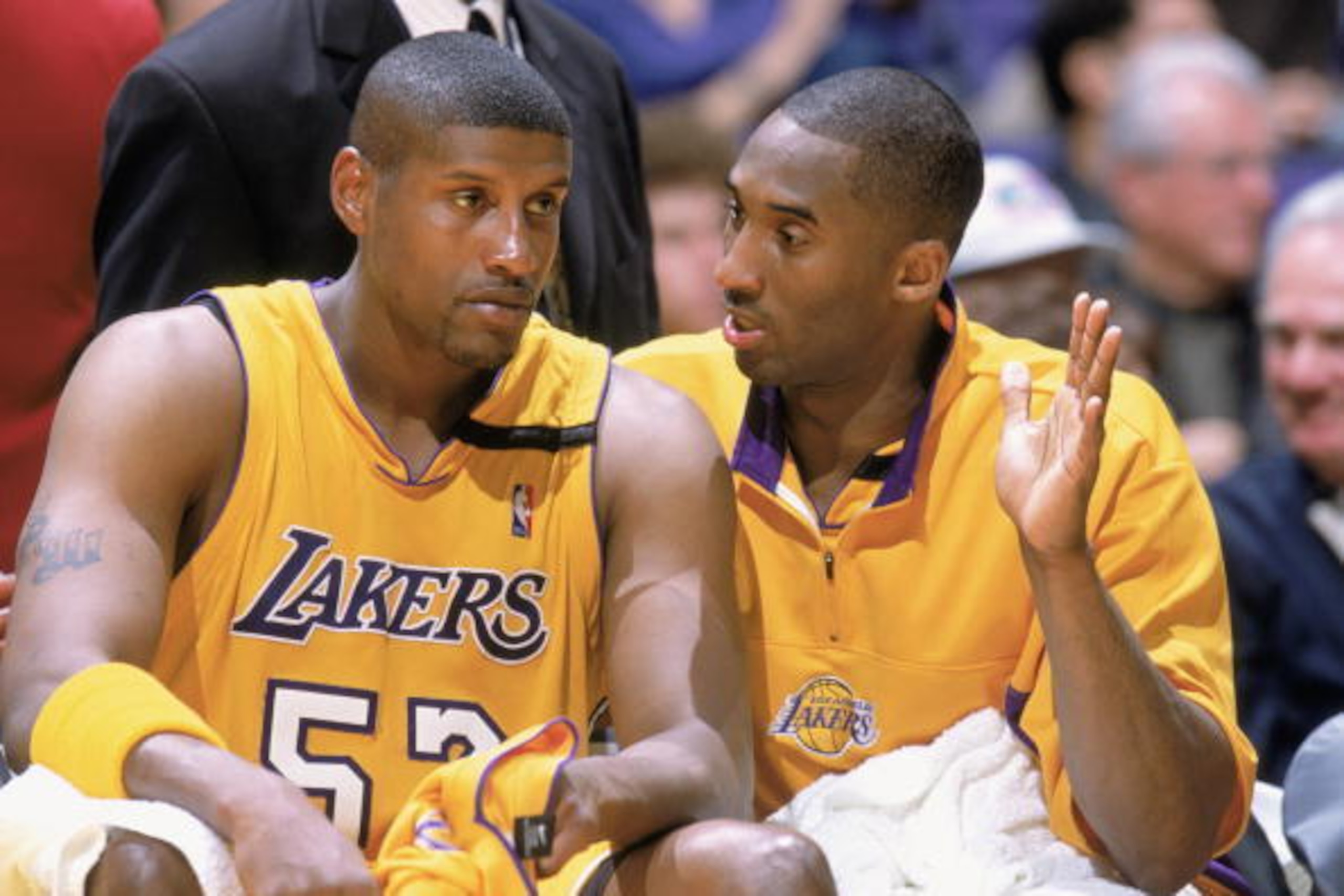 LOS ANGELES - FEBRUARY 14: Kobe Bryant #8 of the Los Angeles Lakers talks to Samaki Walker #52 during the NBA game against the San Antonio Spurs at Staples Center on February 14, 2003 in Los Angeles, California. The Spurs won 103-95. NOTE TO USER: User ex