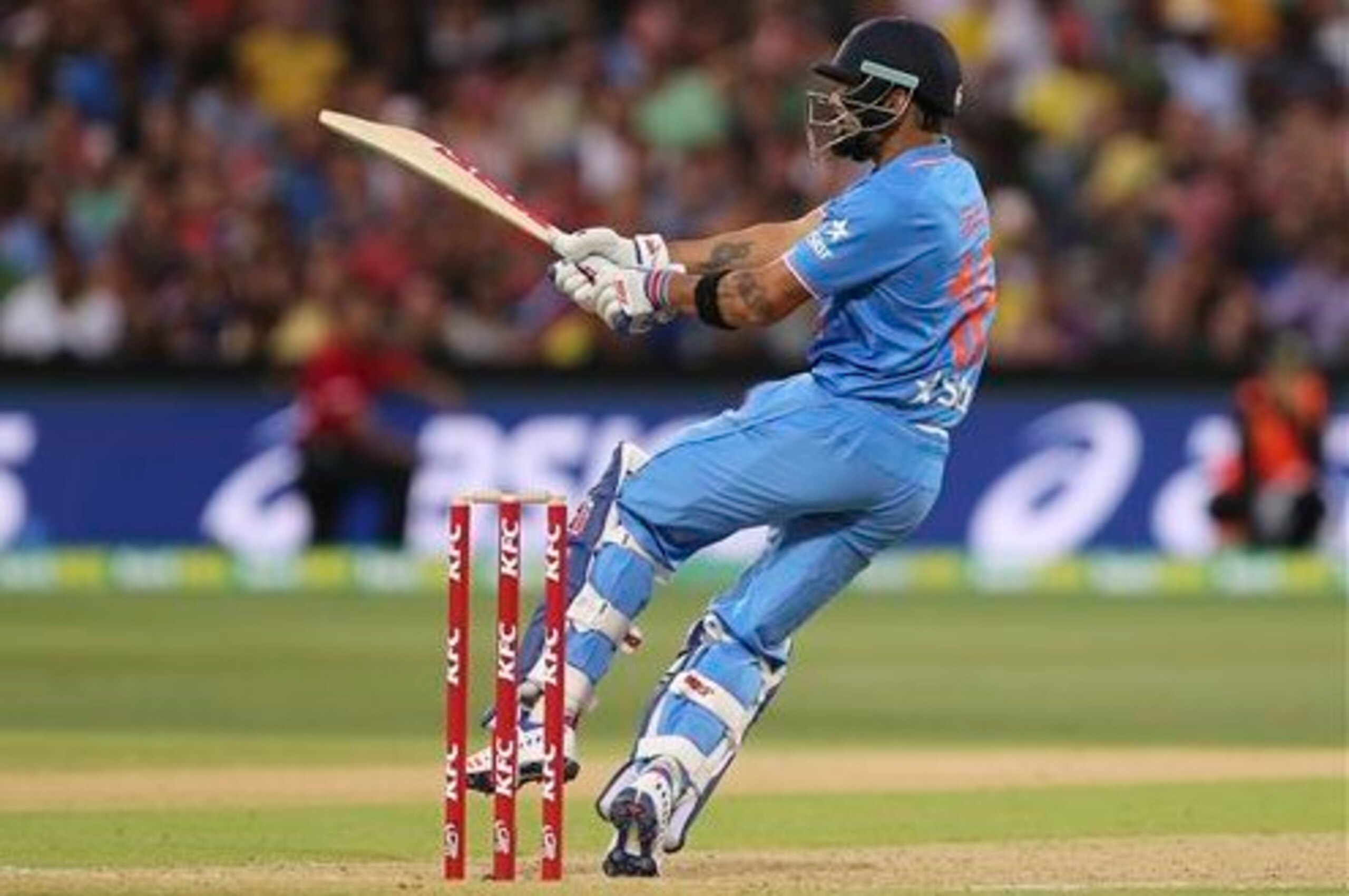 Virat Kohli pulls away a boundary during his unbeaten 90 in Adelaide.