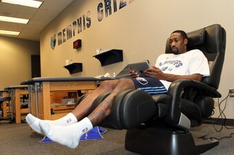 MEMPHIS, TN - MAY 9: Gilbert Arenas #10 of the Memphis Grizzlies uses an Apple Inc. iPad before Game Five of the Western Conference Quarterfinals against the Los Angeles Clippers during the 2012 NBA Playoffs on May 9, 2012 at FedExForum in Memphis, Tennes