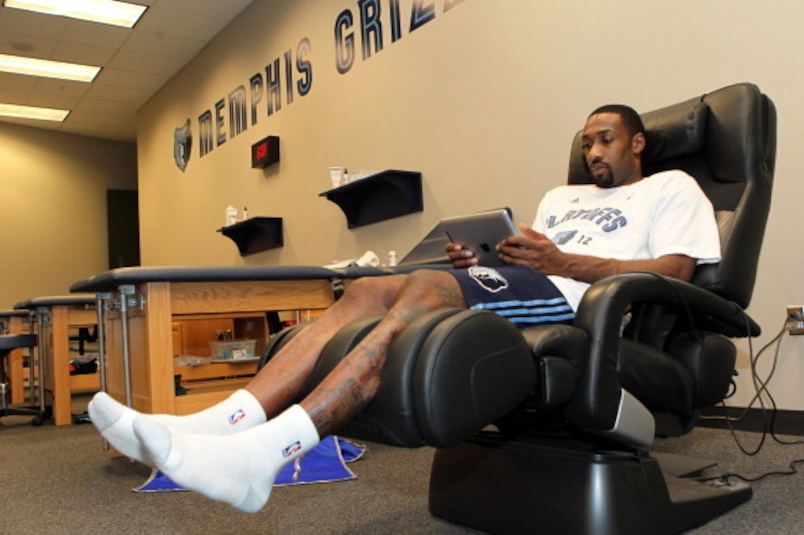 MEMPHIS, TN - MAY 9: Gilbert Arenas #10 of the Memphis Grizzlies uses an Apple Inc. iPad before Game Five of the Western Conference Quarterfinals against the Los Angeles Clippers during the 2012 NBA Playoffs on May 9, 2012 at FedExForum in Memphis, Tennes