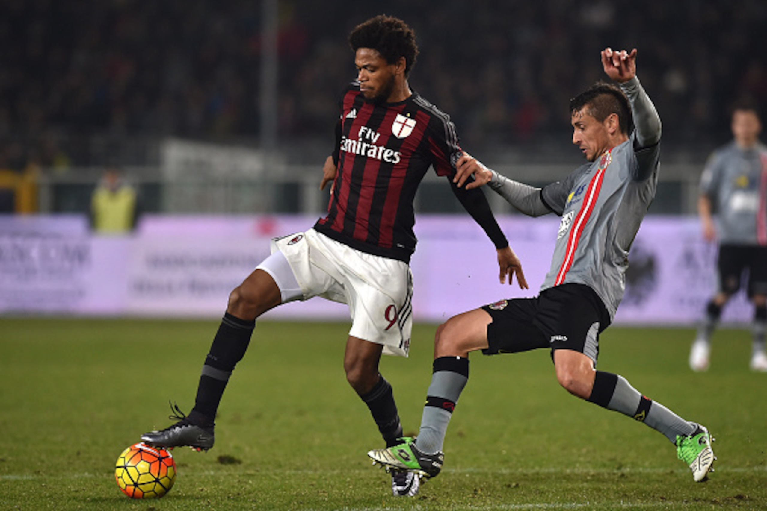 TURIN, ITALY - JANUARY 26: Cristian Sosa (R) of US Alessandria competes with Luiz Adriano of AC Milan during the TIM Cup match between US Alessandria and AC Milan at Olimpico Stadium on January 26, 2016 in Turin, Italy. (Photo by Valerio Pennicino/Getty TURIN, ITALY - JANUARY 26: Cristian Sosa (R) of US Alessandria competes with Luiz Adriano of AC Milan during the TIM Cup match between US Alessandria and AC Milan at Olimpico Stadium on January 26, 2016 in Turin, Italy. (Photo by Valerio Pennicino/Getty