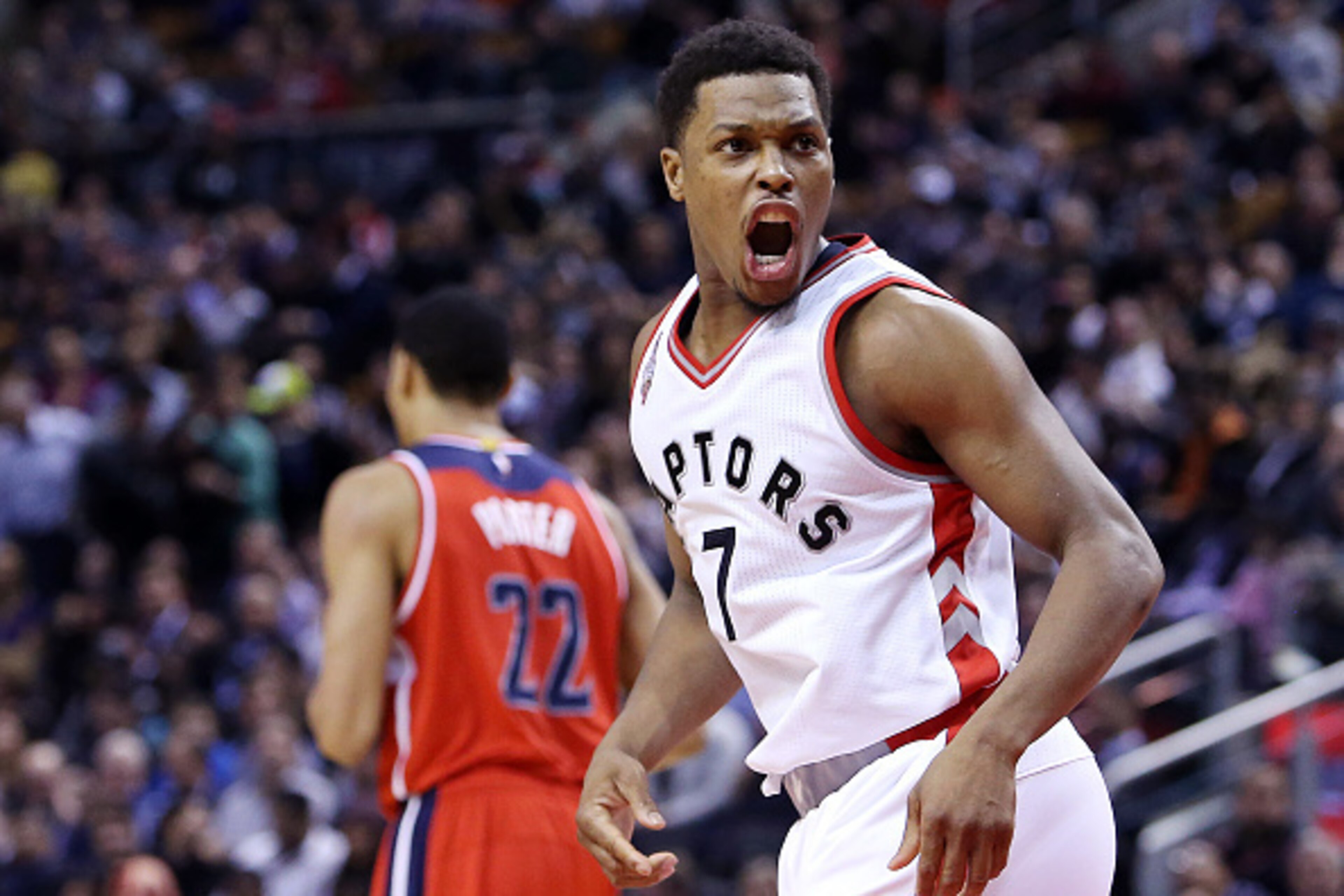 TORONTO, ON - JANUARY 26:  Kyle Lowry #7 of  the Toronto Raptors talks to the referee during an NBA game against the Washington Wizards at the Air Canada Centre on January 26, 2015 in Toronto, Ontario, Canada.  NOTE TO USER: User expressly acknowledges an