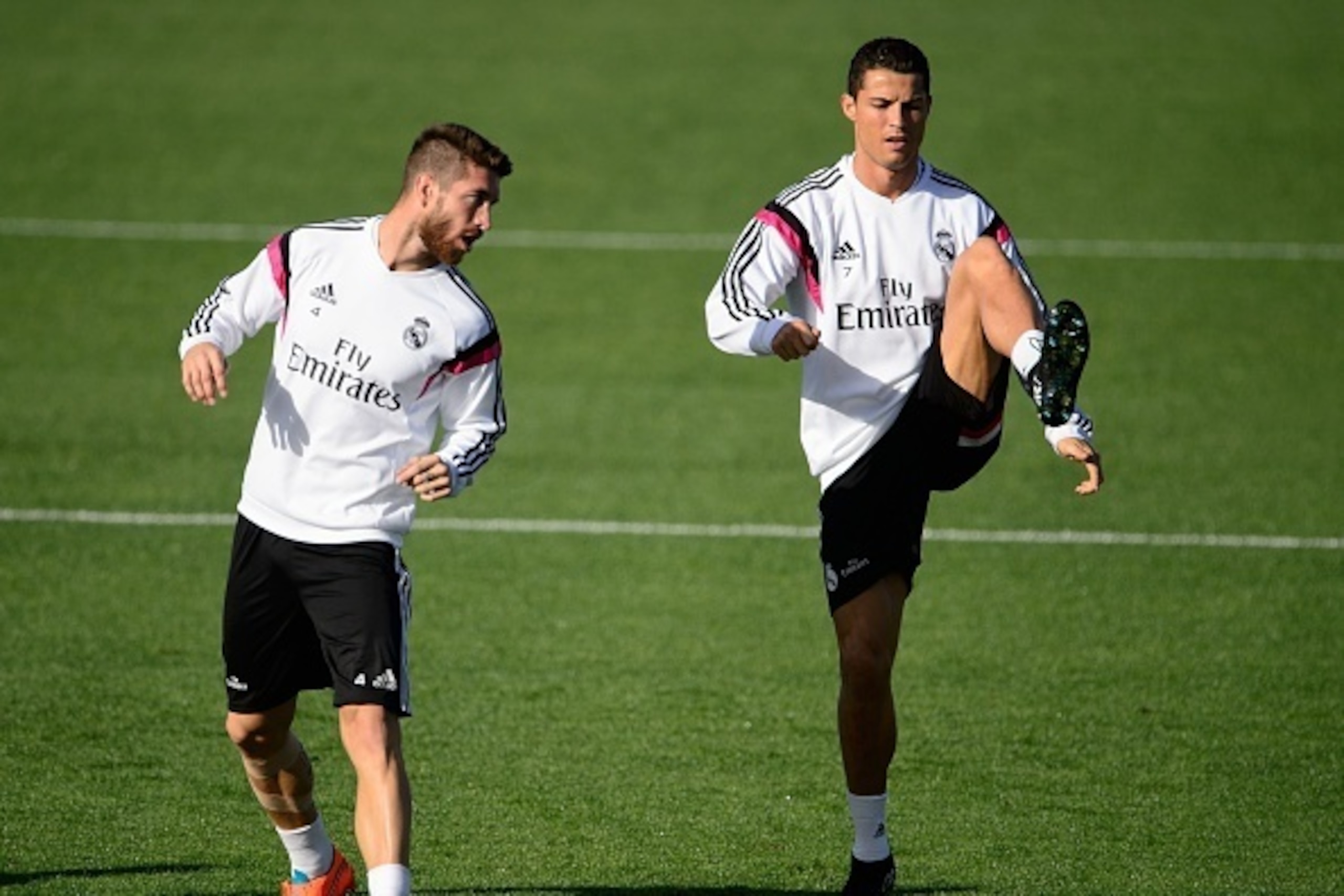 Real Real Madrid's Portuguese forward Cristiano Ronaldo (C) and Real Madrid's defender Sergio Ramos take part in a training session on the eve of the Spanish 'clasico' football match Real Madrid vs Barcelona at the Valdebebas training center in Madrid on 
