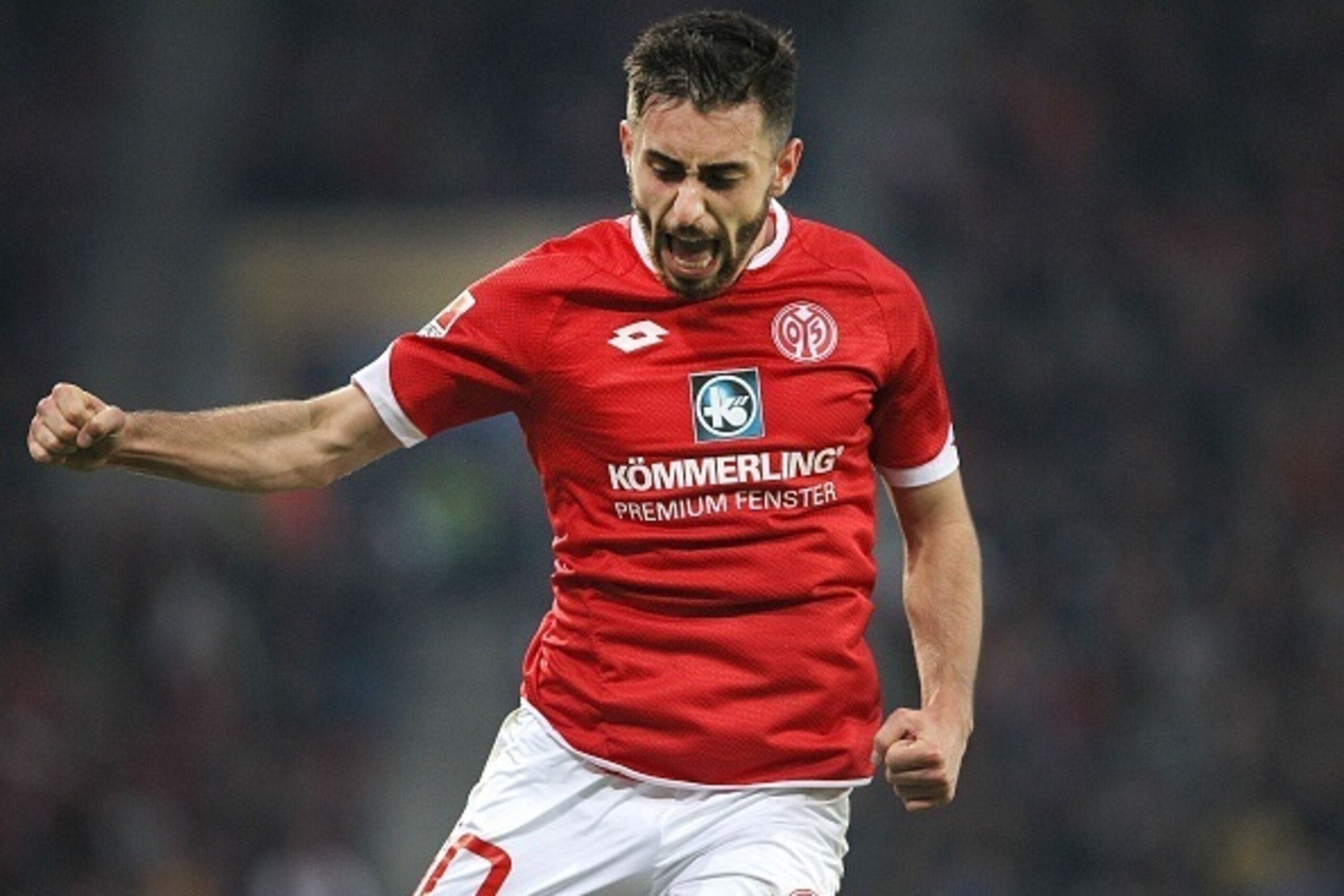Mainz' midfielder Yunus Malli celebrates after scoring 2-0 during the German first division football Bundesliga match between Mainz and Wolfsburg on November 7, 2015, 2015 in Mainz, southern Germany. AFP PHOTO / DANIEL ROLAND

RESTRICTIONS: DURING MATCH T