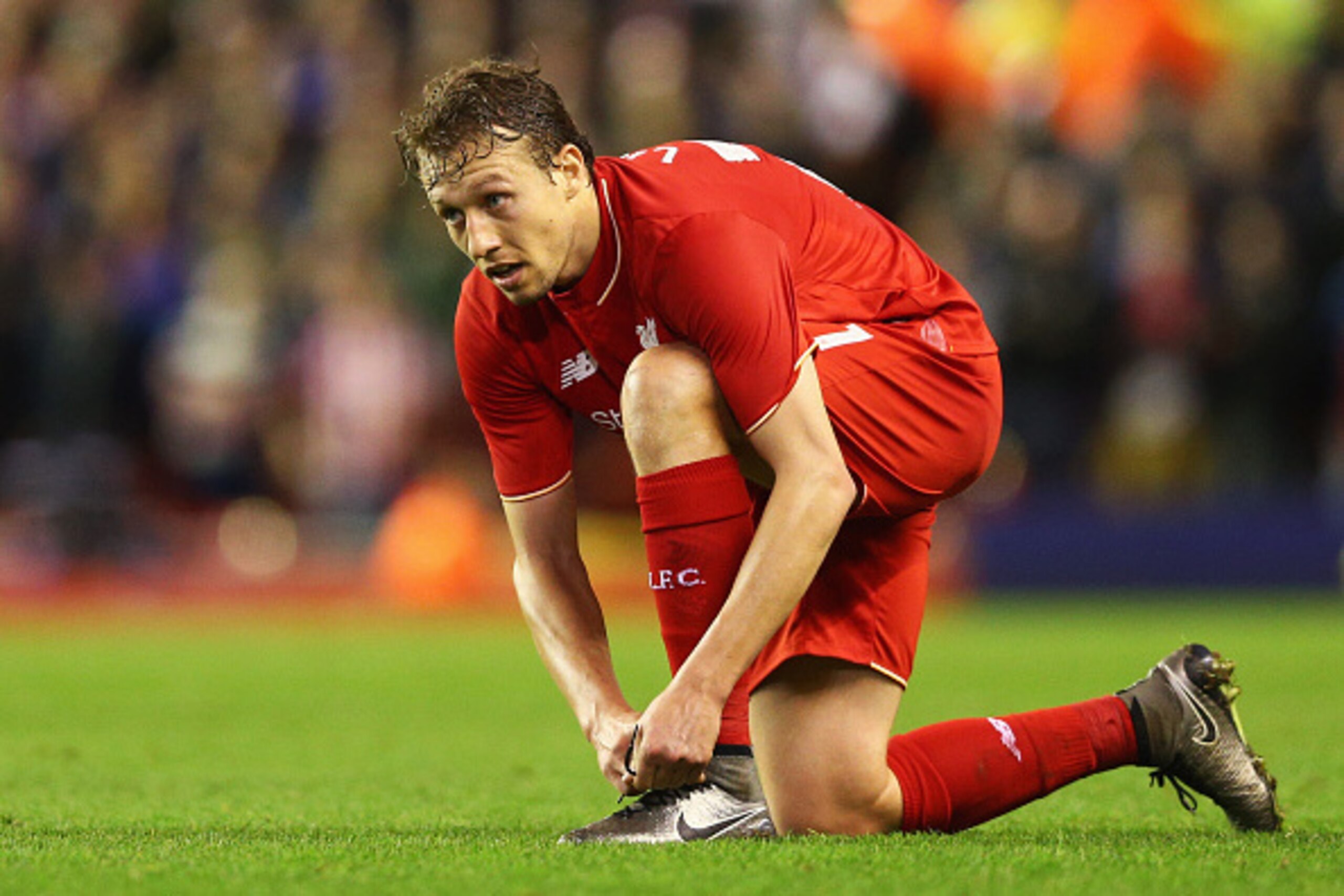 LIVERPOOL, ENGLAND - JANUARY 26:  Lucas Leiva of Liverpool looks on during the Capital One Cup semi final second leg match between Liverpool and Stoke City at Anfield on January 26, 2016 in Liverpool, England.  (Photo by Clive Brunskill/Getty Images)