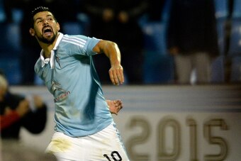 Celta Vigo's forward Nolito celebrates after scoring a goal during the Spanish league football match RC Celta de Vigo vs Real Sporting de Gijon at the Balaidos stadium in Vigo on November 28, 2015.   Celta won the match 2-1. AFP PHOTO/ MIGUEL RIOPA / AFP 