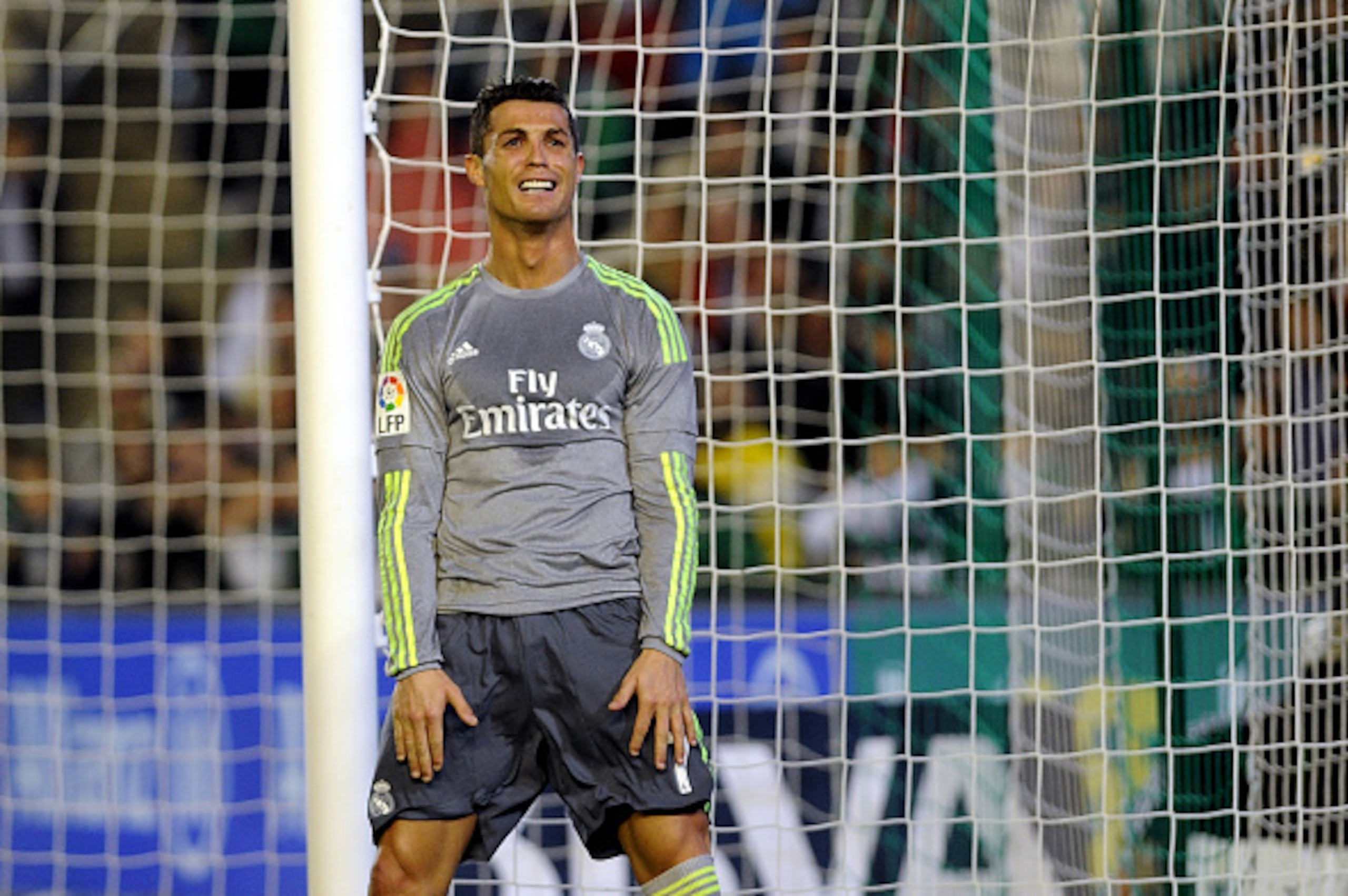 Real Madrid's Portuguese forward Cristiano Ronaldo looks skywards during the Spanish league football match Real Betis Balompie vs Real Madrid CF at the Benito Villamarin stadium in Sevilla on January 24, 2016.The match ended in a draw 1-1.  AFP PHOTO / CR