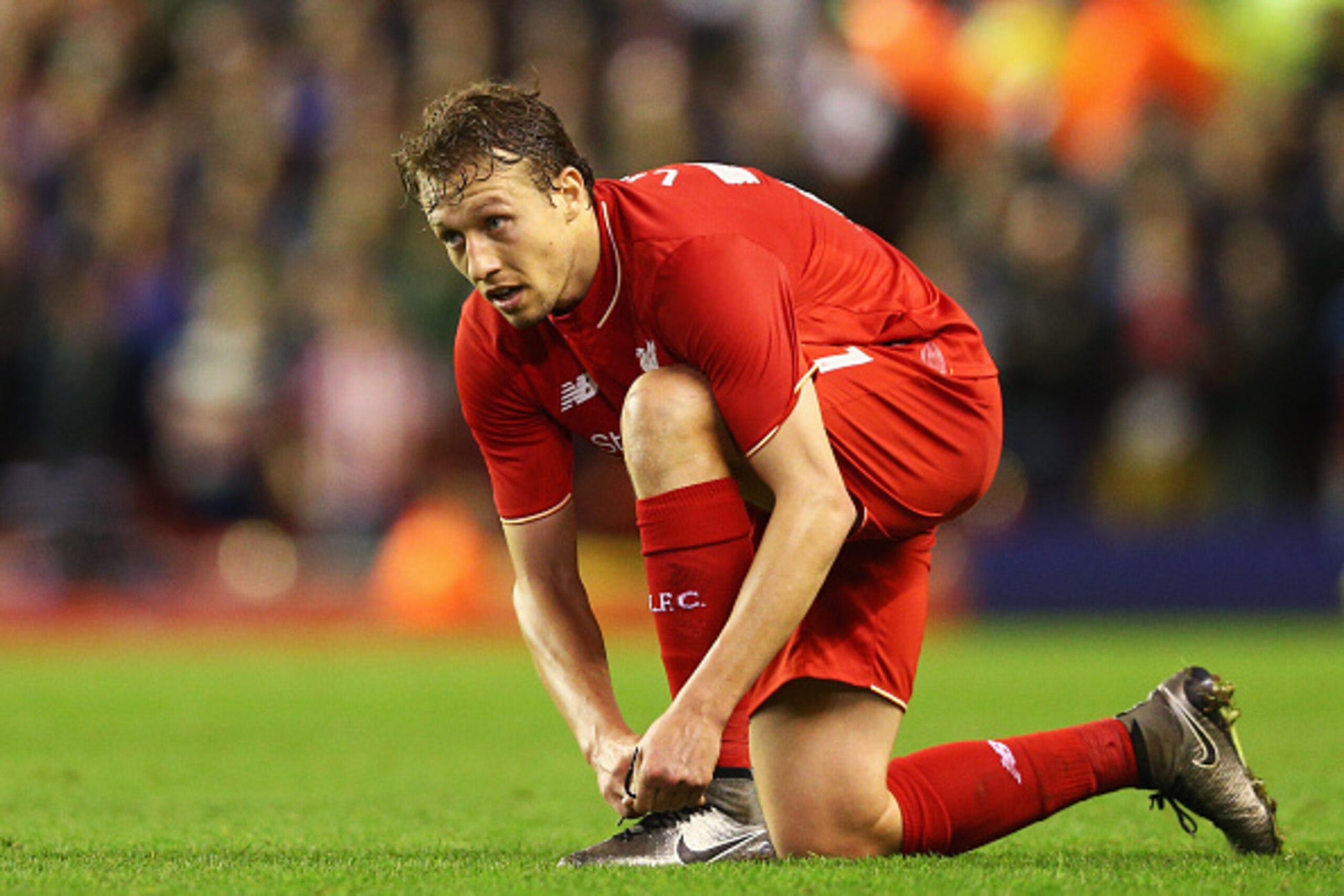 LIVERPOOL, ENGLAND - JANUARY 26:  Lucas Leiva of Liverpool looks on during the Capital One Cup semi final second leg match between Liverpool and Stoke City at Anfield on January 26, 2016 in Liverpool, England.  (Photo by Clive Brunskill/Getty Images)