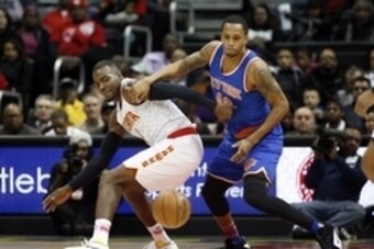 Jan 5, 2016; Atlanta, GA, USA; Atlanta Hawks forward Paul Millsap (4) and New York Knicks forward Lance Thomas (42) fight for a loose ball in the first quarter of their game at Philips Arena. Mandatory Credit: Jason Getz-USA TODAY Sports