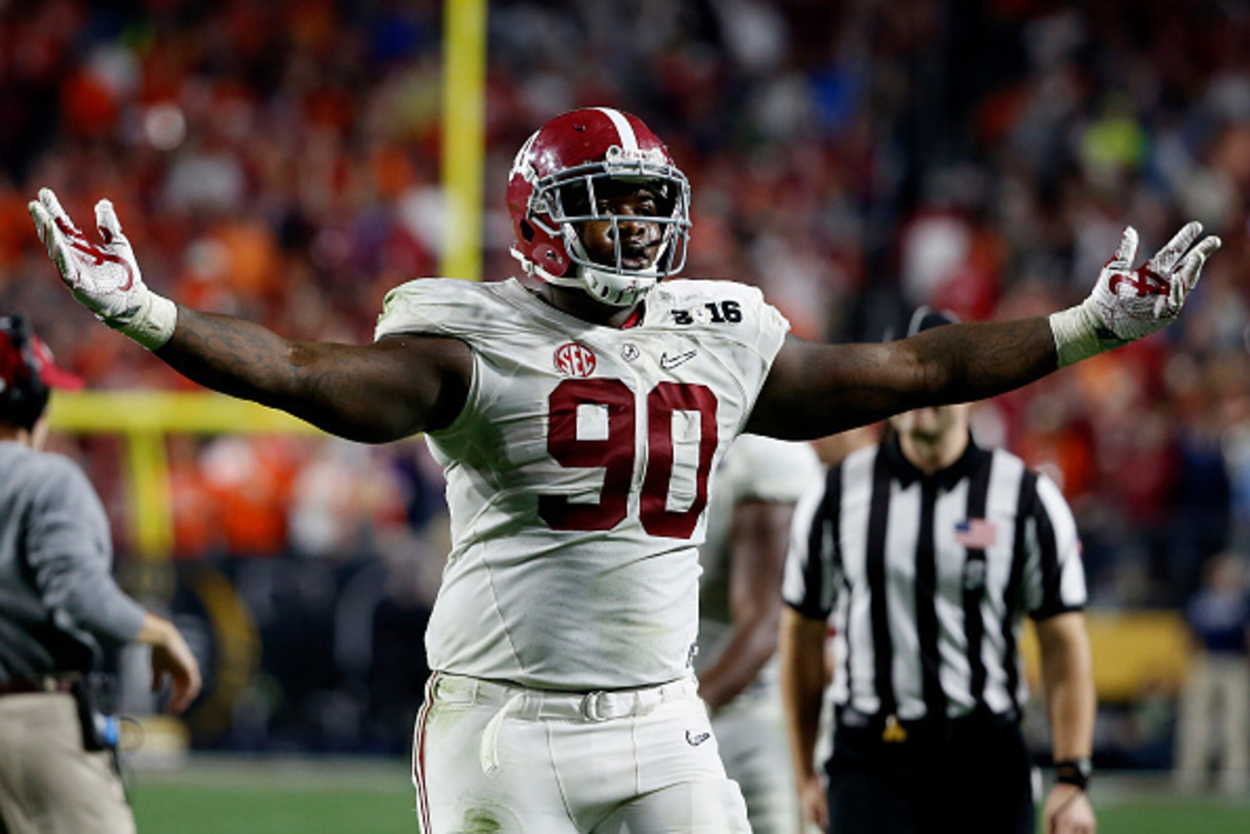 GLENDALE, AZ - JANUARY 11:  Jarran Reed #90 of the Alabama Crimson Tide celebrates a play against the Clemson Tigers during the 2016 College Football Playoff National Championship Game at University of Phoenix Stadium on January 11, 2016 in Glendale, Ariz