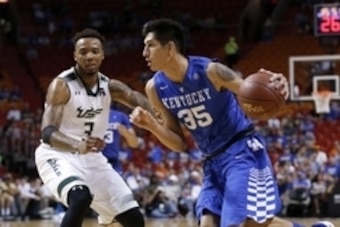 Nov 27, 2015; Miami, FL, USA; South Florida Bulls guard Roddy Peters (3) applies pressure to Kentucky Wildcats forward Derek Willis (35) during the second half at American Airlines Arena. Mandatory Credit: Steve Mitchell-USA TODAY Sports