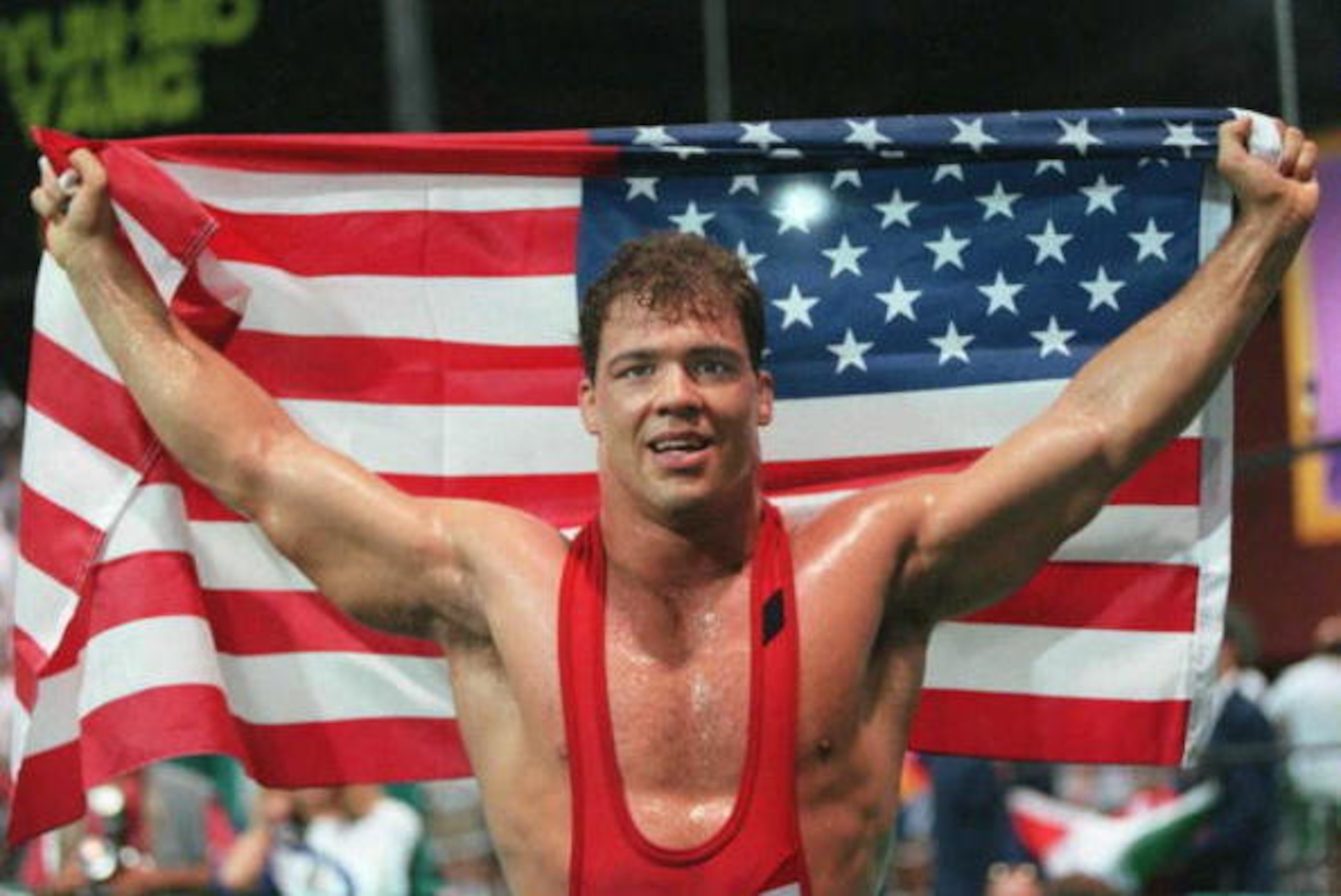 ATLANTA, GA - JULY 31:  Kurt Angle of the US displays the national flag after winning the gold medal in the men's 100kg Olympic freestyle wrestling event at the Georgia World Congress Center in Atlanta, Georgia, 31 July. (FOR EDITORIAL USE ONLY) AFP-IOPP/