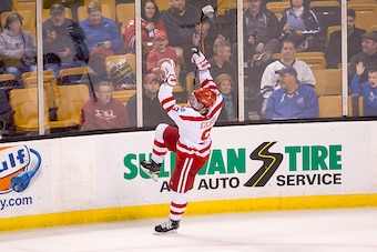 BOSTON, MA - MARCH 20: Jack Eichel #9 of the Boston University Terriers celebrates his second of two goals against the New Hampshire Wildcats during NCAA hockey in the Hockey East Championship Semifinal at TD Garden on March 20, 2015 in Boston, Massachuse