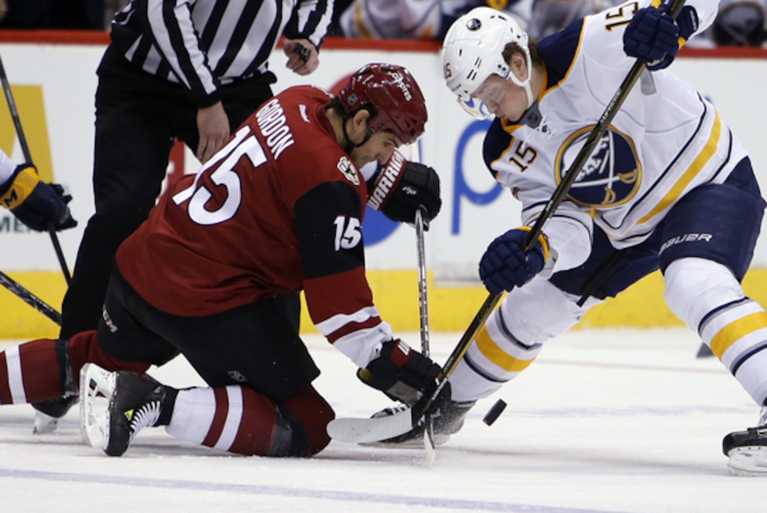Eichel battles for the puck against the Arizona Coyotes.