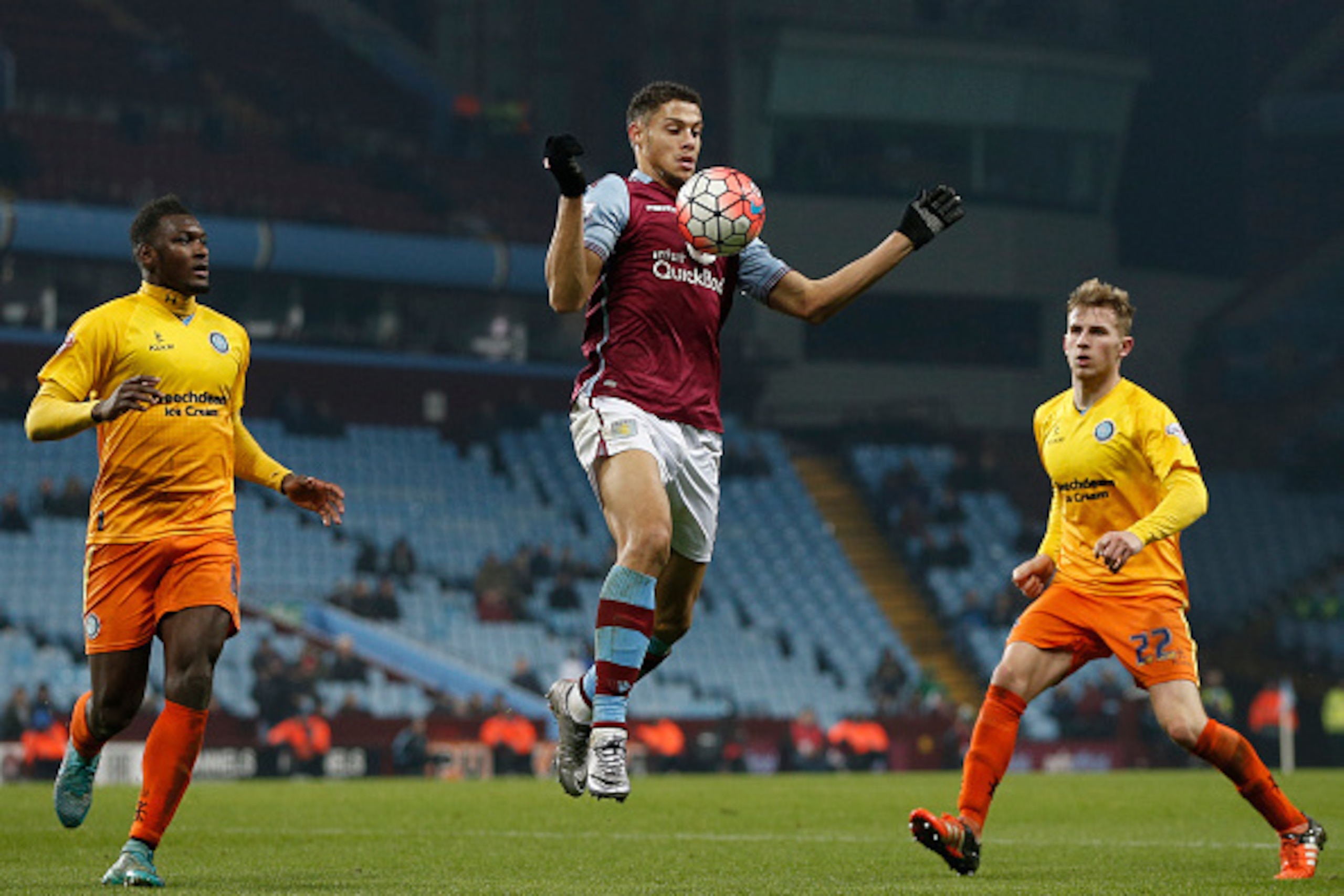 Aston Villa's French-born Beninese striker Rudy Gestede (C) controls the ball during the English FA Cup third round replay football match between Aston Villa and Wycombe Wanderers at Villa Park in Birmingham, central England on January 19, 2016. Aston Vil