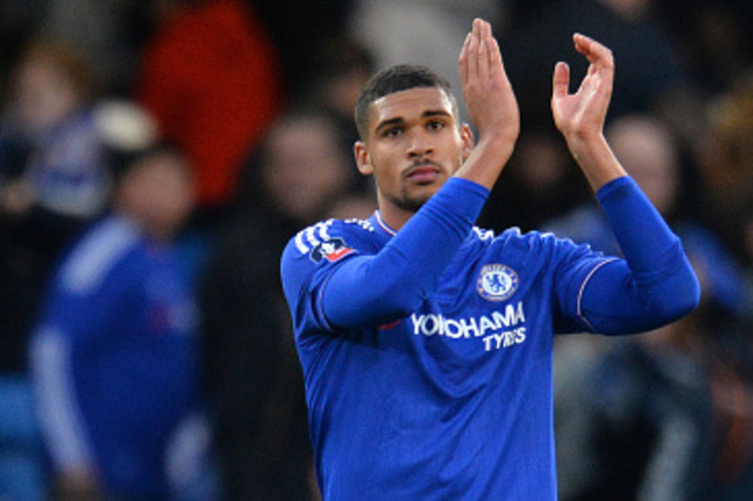 Chelsea's English midfielder Ruben Loftus-Cheek applauds the fans following the FA Cup third-round football match between Chelsea and Scunthorpe United at Stamford Bridge in London on January 10, 2016. Chelsea won the match 2-0.   AFP PHOTO / GLYN KIRK

R