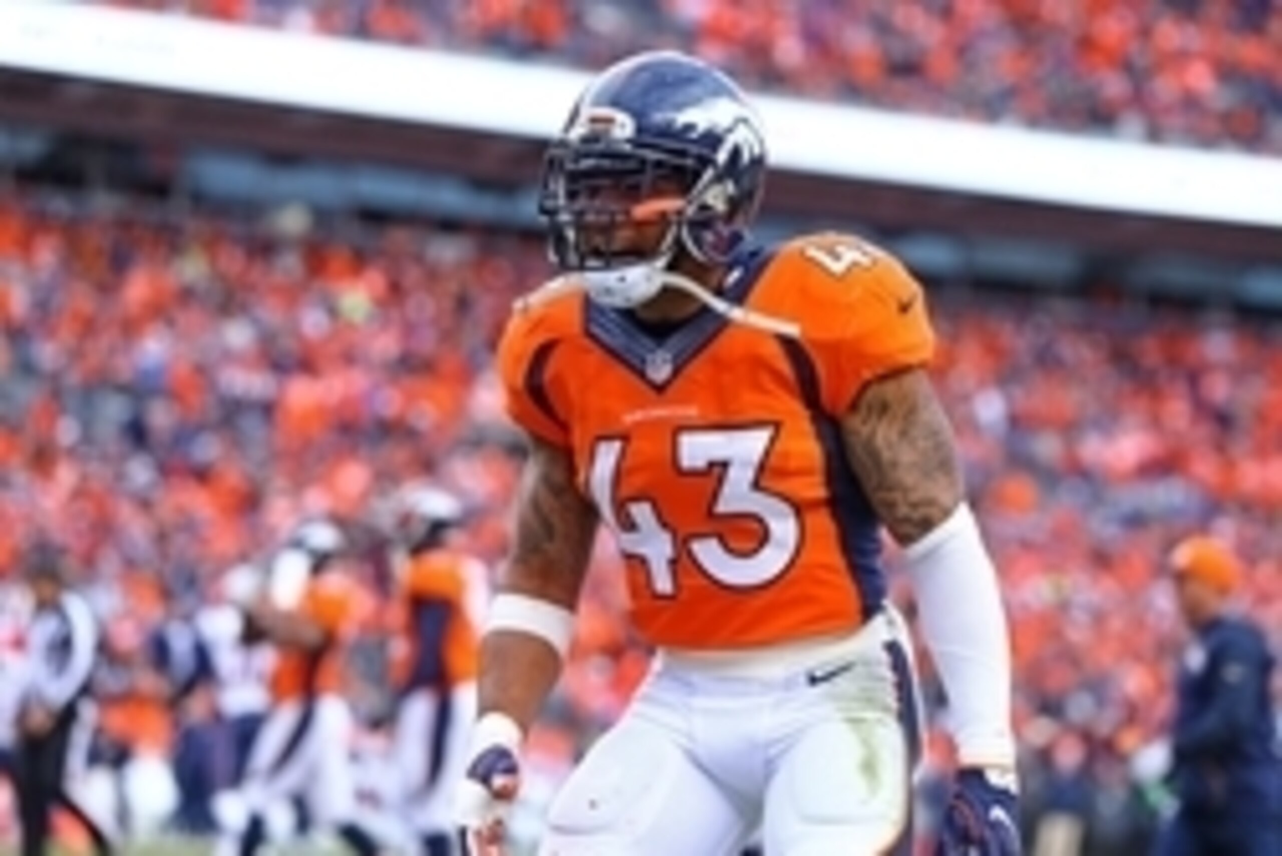 Jan 24, 2016; Denver, CO, USA; Denver Broncos safety T.J. Ward (43) reacts as he celebrates a play against the New England Patriots in the AFC Championship football game at Sports Authority Field at Mile High. The Broncos defeated the Patriots 20-18 to ad Jan 24, 2016; Denver, CO, USA; Denver Broncos safety T.J. Ward (43) reacts as he celebrates a play against the New England Patriots in the AFC Championship football game at Sports Authority Field at Mile High. The Broncos defeated the Patriots 20-18 to ad