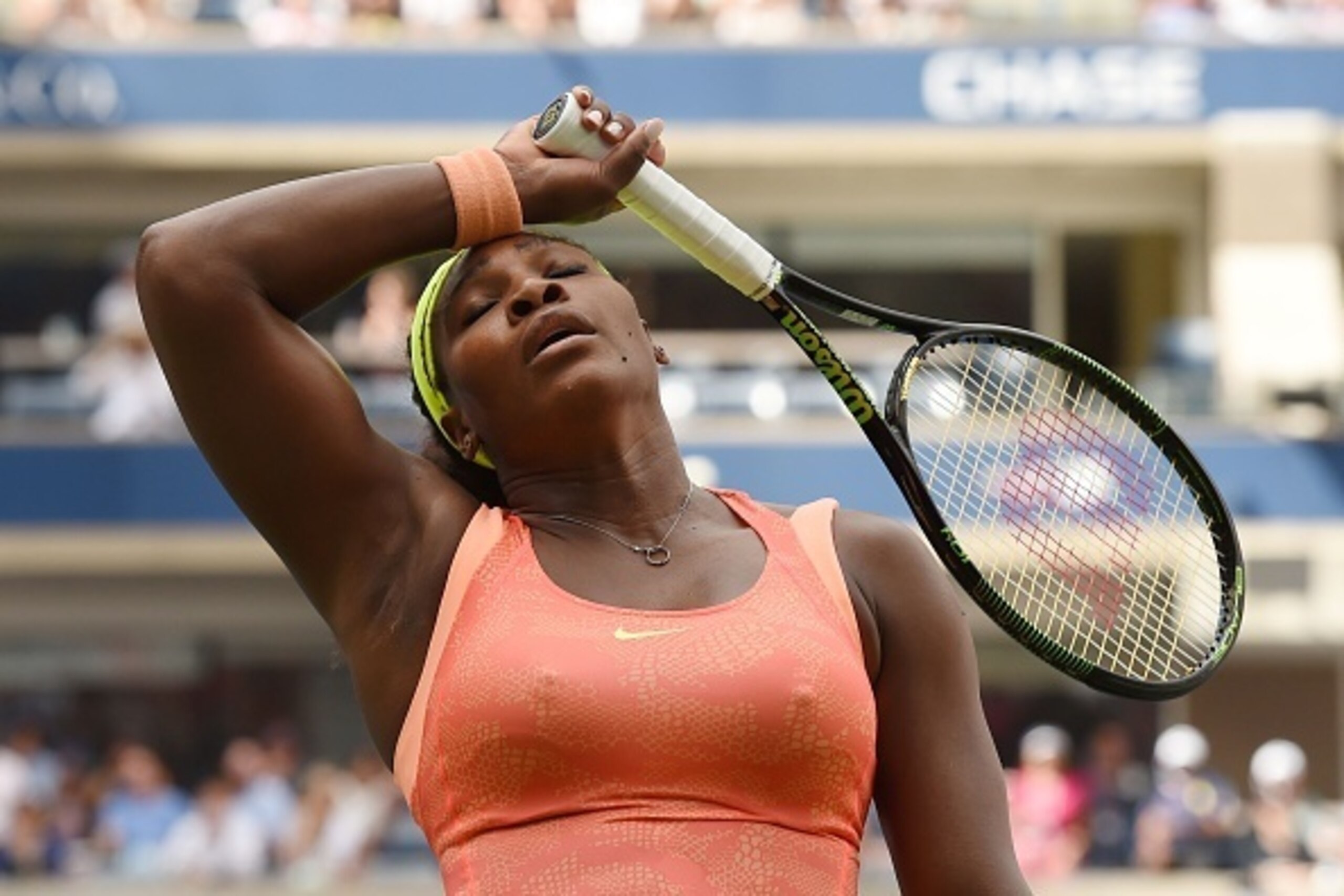 Serena Williams of the US wipes her forehead while playing Roberta Vinci of Italy during their US Open 2015 women's singles semifinals match at the USTA Billie Jean King National Center September 11, 2015  in New York. AFP PHOTO/TIMOTHY A. CLARY / AFP / T