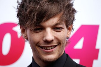SYDNEY, AUSTRALIA - NOVEMBER 26: Louis Tomlinson from One Direction arrives at the 28th Annual ARIA Awards 2014 at the Star on November 26, 2014 in Sydney, Australia.  (Photo by Brendon Thorne/Getty Images)