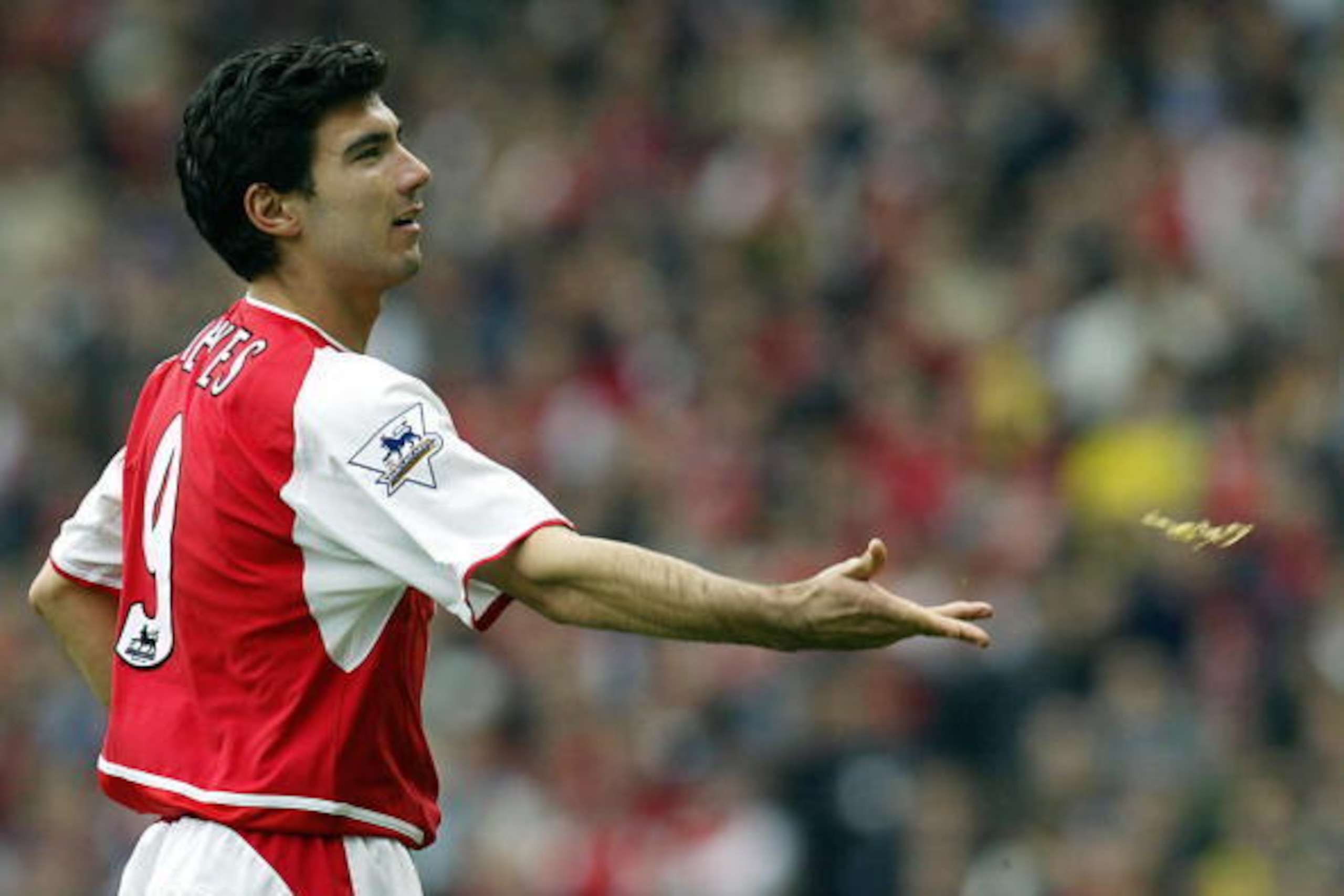 LONDON, UNITED KINGDOM: Arsenal's Spanish forward Jose Reyes throws his necklace to a staff members after he was ordered to take it off playing Manchester United in their FA Cup semi-final clashat Villa park in Birmingham, 03 April 2004.Manchester United LONDON, UNITED KINGDOM: Arsenal's Spanish forward Jose Reyes throws his necklace to a staff members after he was ordered to take it off playing Manchester United in their FA Cup semi-final clashat Villa park in Birmingham, 03 April 2004.Manchester United