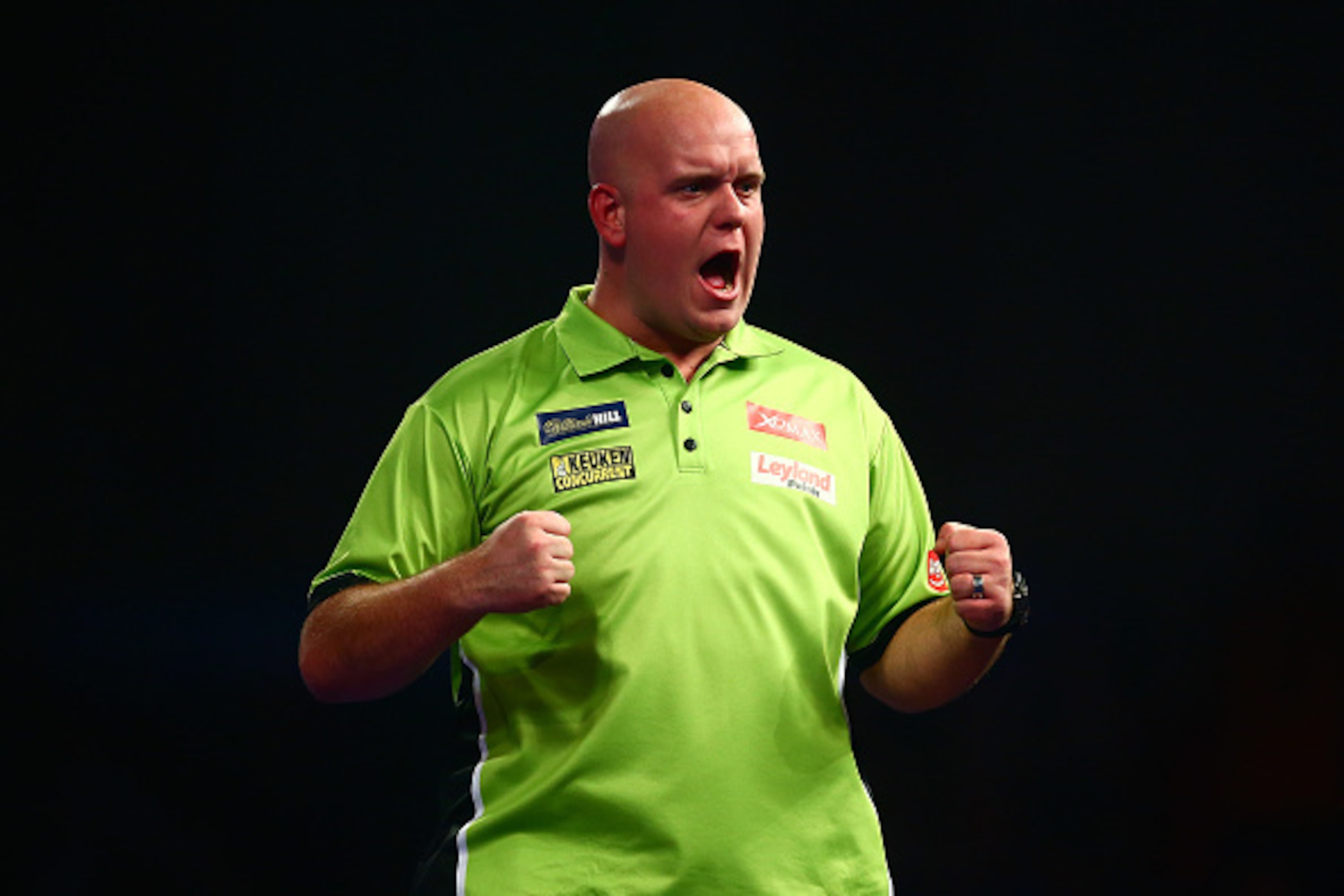 LONDON, ENGLAND - DECEMBER 29:  Michael van Gerwen of Holland celebrates a point in his third round match against Raymond van Barneveld of Holland on Day Eleven of the 2016 William Hill PDC World Darts Championships at Alexandra Palace on December 29, 201