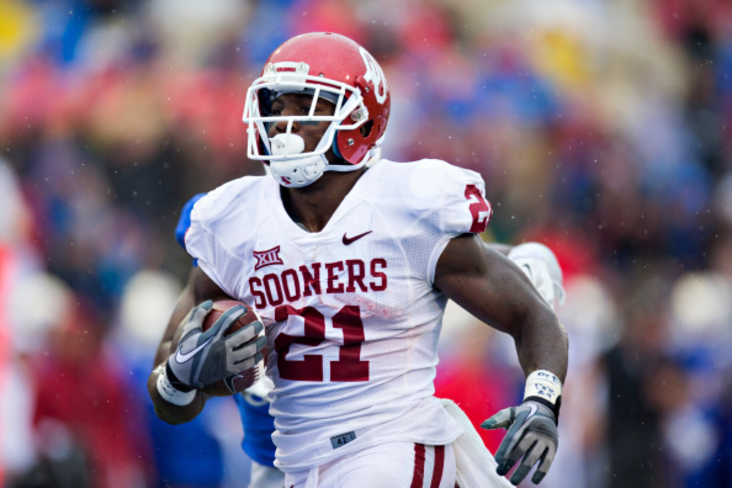 TULSA, OK - SEPTEMBER 6: Keith Ford #21 of the Oklahoma Sooners runs the ball against the Tulsa Golden Hurricanes at H.A. Chapman Stadium on September 6, 2014 in Tulsa, Oklahoma. The Sooners defeated the Golden Hurricanes 52-7. (Photo by Wesley Hitt/Ge TULSA, OK - SEPTEMBER 6: Keith Ford #21 of the Oklahoma Sooners runs the ball against the Tulsa Golden Hurricanes at H.A. Chapman Stadium on September 6, 2014 in Tulsa, Oklahoma. The Sooners defeated the Golden Hurricanes 52-7. (Photo by Wesley Hitt/Ge