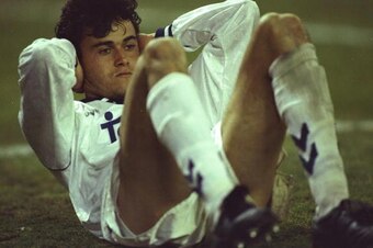 2 Mar 1993:  Luis Enrique Martinez of Real Madrid sits on the pitch during the UEFA Cup quarter-final First Leg match against Paris St Germain at the Santiago Bernabeu Stadium in Madrid, Spain. Real Madrid won the match 3-1. \ Mandatory Credit: Mike  Hewi
