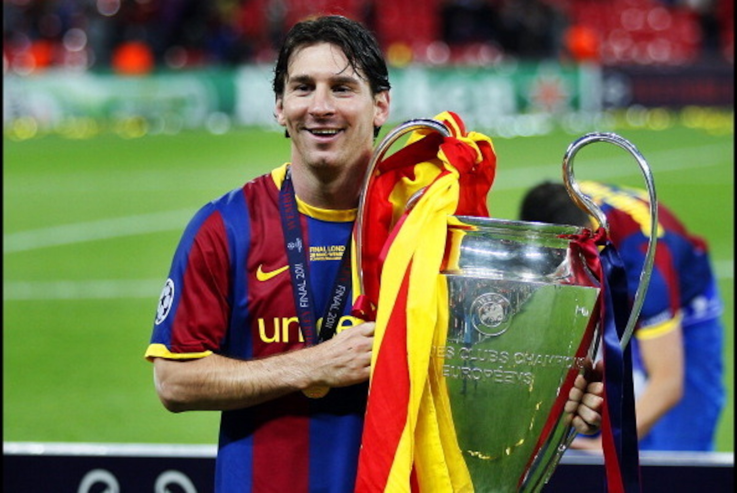 Lionel Messi with the trophy after the UEFA Champions League final between FC Barcelona and Manchester United FC at Wembley Stadium on May 28, 2011 in London, England.  (Photo by Vi-Images/VI-Images via Getty Images)