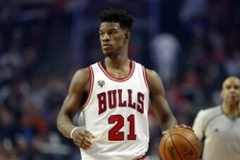 Jan 7, 2016; Chicago, IL, USA; Chicago Bulls guard Jimmy Butler (21) brings the ball up court against the Boston Celtics during the second half at United Center. The Bulls won 101-92. Mandatory Credit: Kamil Krzaczynski-USA TODAY Sports