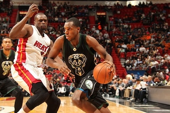 MIAMI, FL - JANUARY 19:  Khris Middleton #22 of the Milwaukee Bucks drives to the basket against the Miami Heat on January 19, 2016 at AmericanAirlines Arena in Miami, Florida. NOTE TO USER: User expressly acknowledges and agrees that, by downloading and 