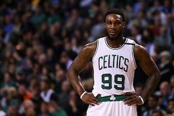 BOSTON, MA - DECEMBER 30:  Jae Crowder #99 of the Boston Celtics looks on during the third quarter against the Los Angeles Lakers at TD Garden on December 30, 2015 in Boston, Massachusetts.  NOTE TO USER: User expressly acknowledges and agrees that, by do