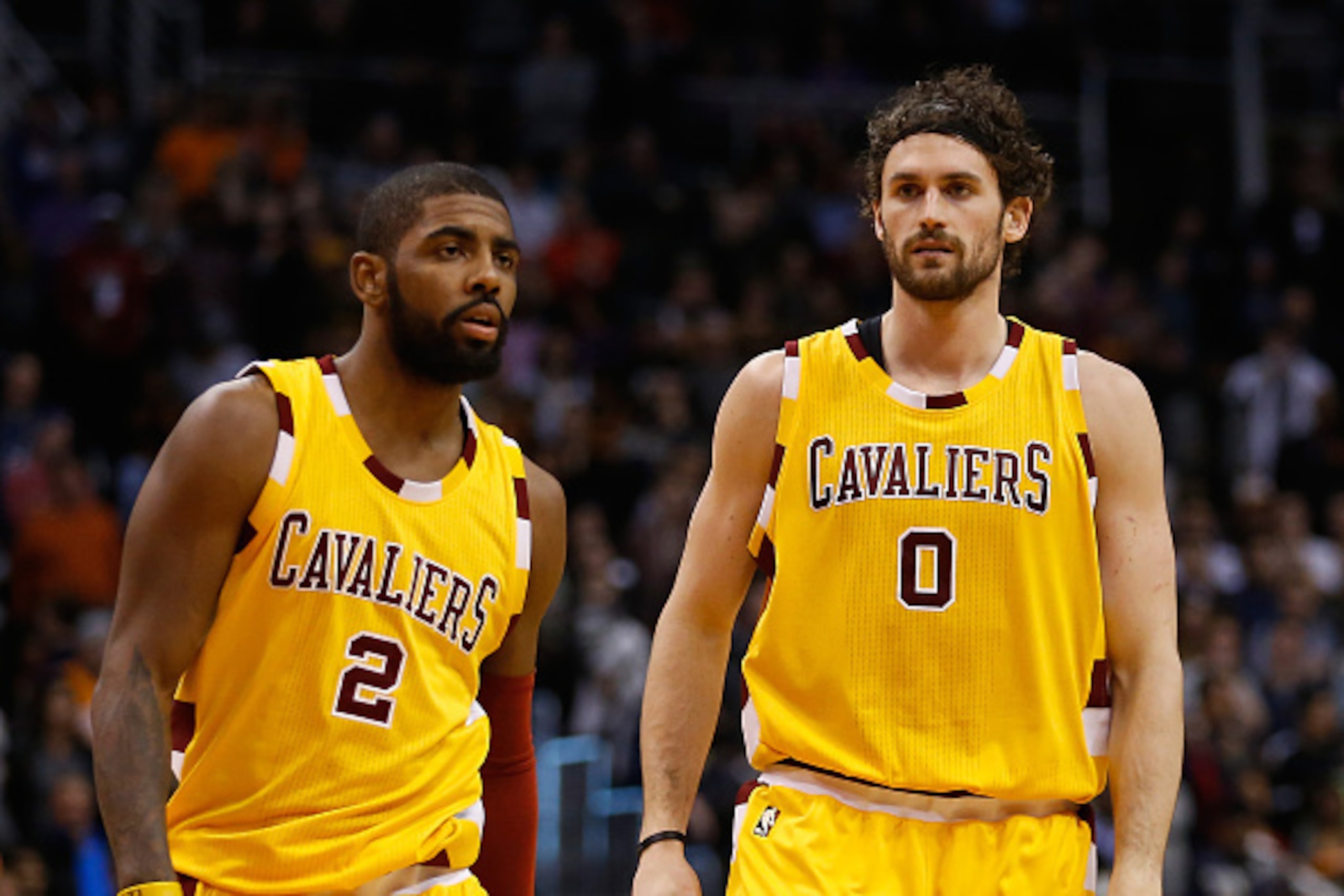 PHOENIX, AZ - DECEMBER 28:  (R-L) Kevin Love #0 and Kyrie Irving #2 of the Cleveland Cavaliers during the NBA game against the Phoenix Suns at Talking Stick Resort Arena on December 28, 2015 in Phoenix, Arizona.  NOTE TO USER: User expressly acknowledges 