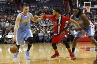 Jan 28, 2016; Washington, DC, USA; Denver Nuggets forward Danilo Gallinari (8) dribbles the ball as Washington Wizards guard Garrett Temple (17) defends in the second quarter at Verizon Center. Mandatory Credit: Geoff Burke-USA TODAY Sports