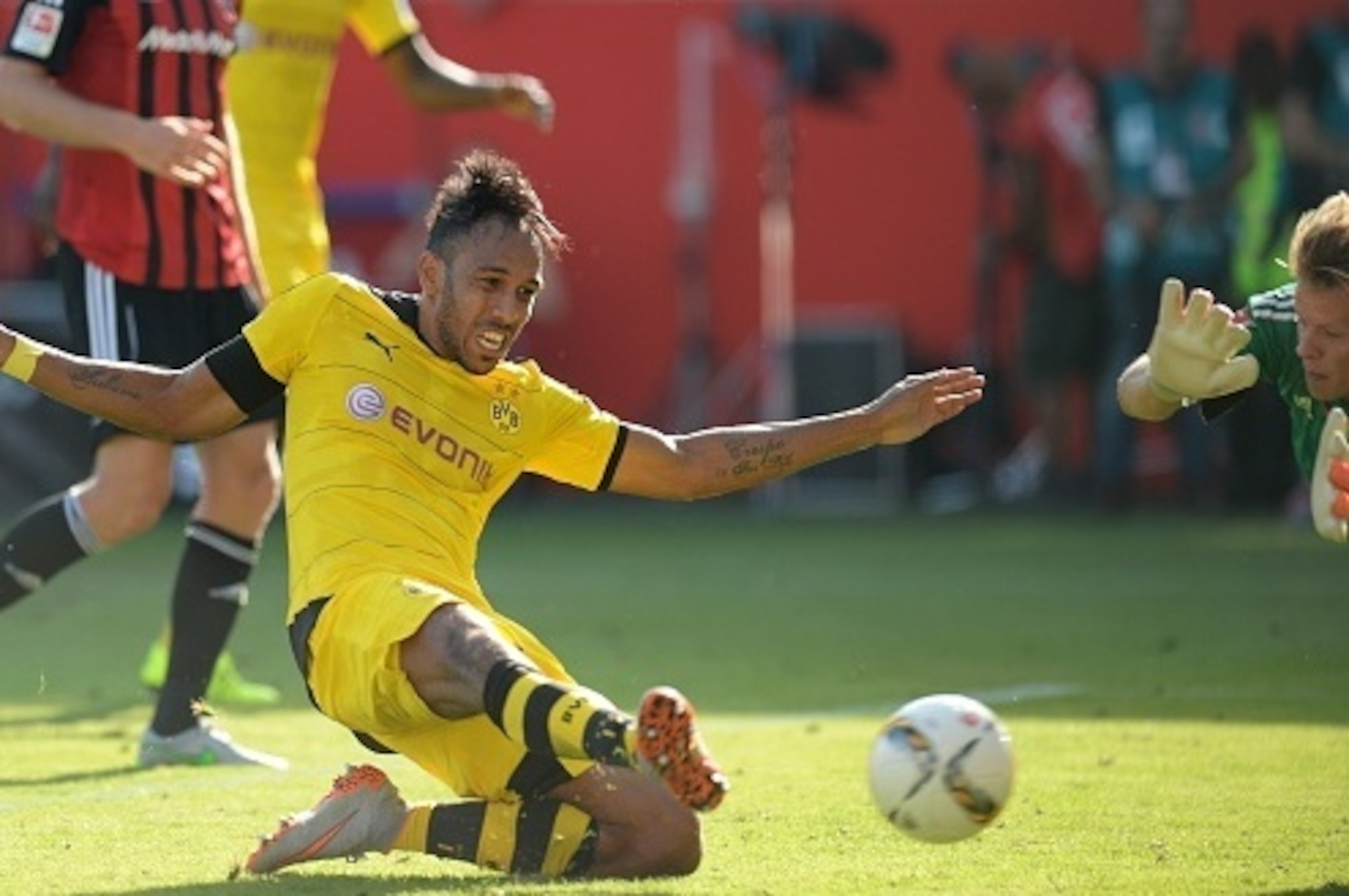 Dortmund's Gabonese striker Pierre-Emerick Aubameyang scores the fourth goal for Dortmund during the German first division Bundesliga match between FC Ingolstadt and Borussia Dortmund in the stadium in Ingolstadt, southern Germany, on August 23, 2015. Dor