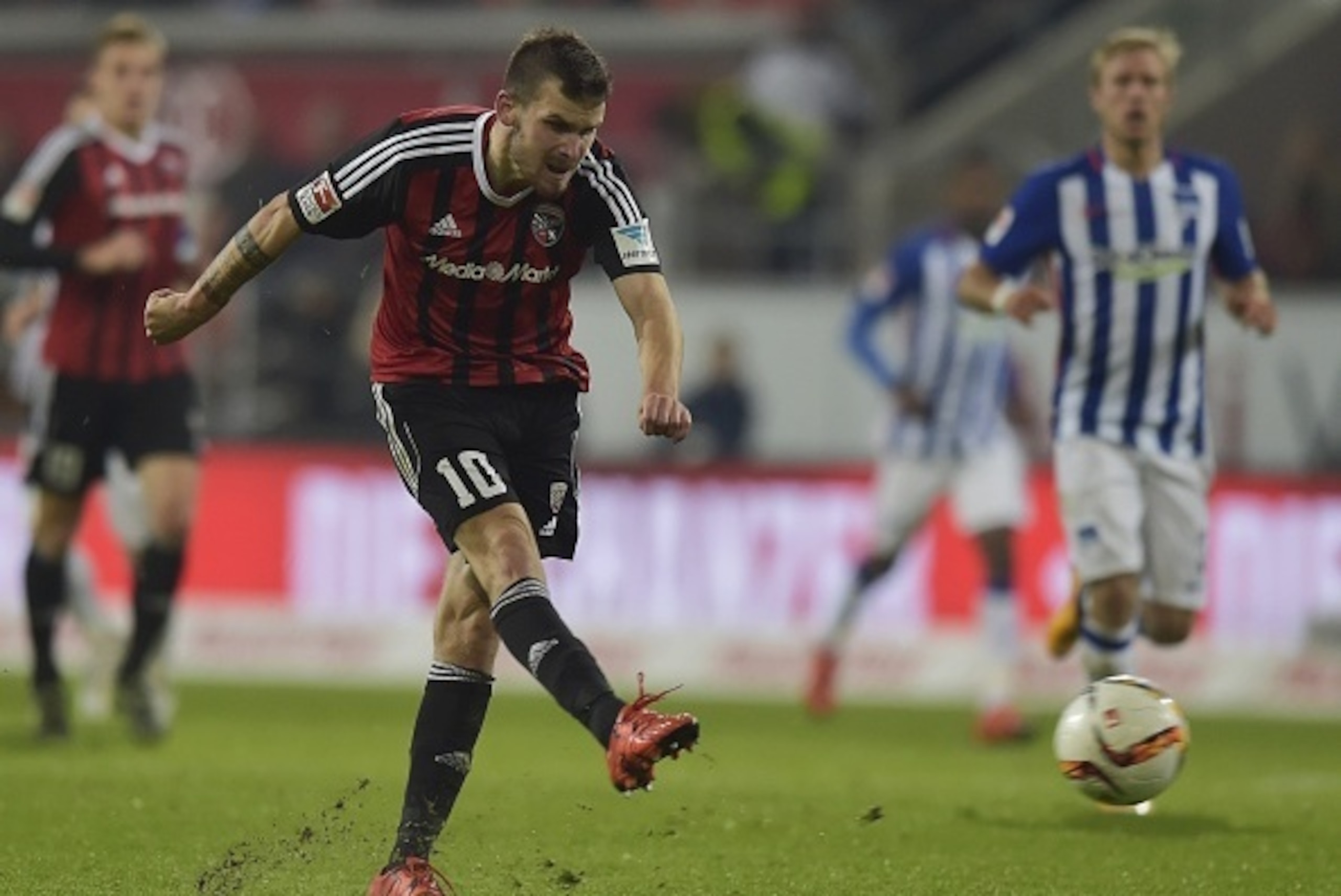 Ingolstadt's  midfielder Pascal Gross kicks the ball during the German first division football Bundesliga match between FC Ingolstadt and Hertha BSC Berlin on October 24, 2015 in Ingolstadt, southern Germany. AFP PHOTO / GUENTER SCHIFFMANN

RESTRICTIONS: 