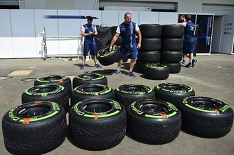 Members of Williams Martini Racing team work in the pits with tires at the Hermanos Rodriguez Racetrack on October 29, 2015. Mexico will hold its Formula 1 Grand Prix on November 1. AFP PHOTO/RONALDO SCHEMIDT        (Photo credit should read RONALDO SCHEM