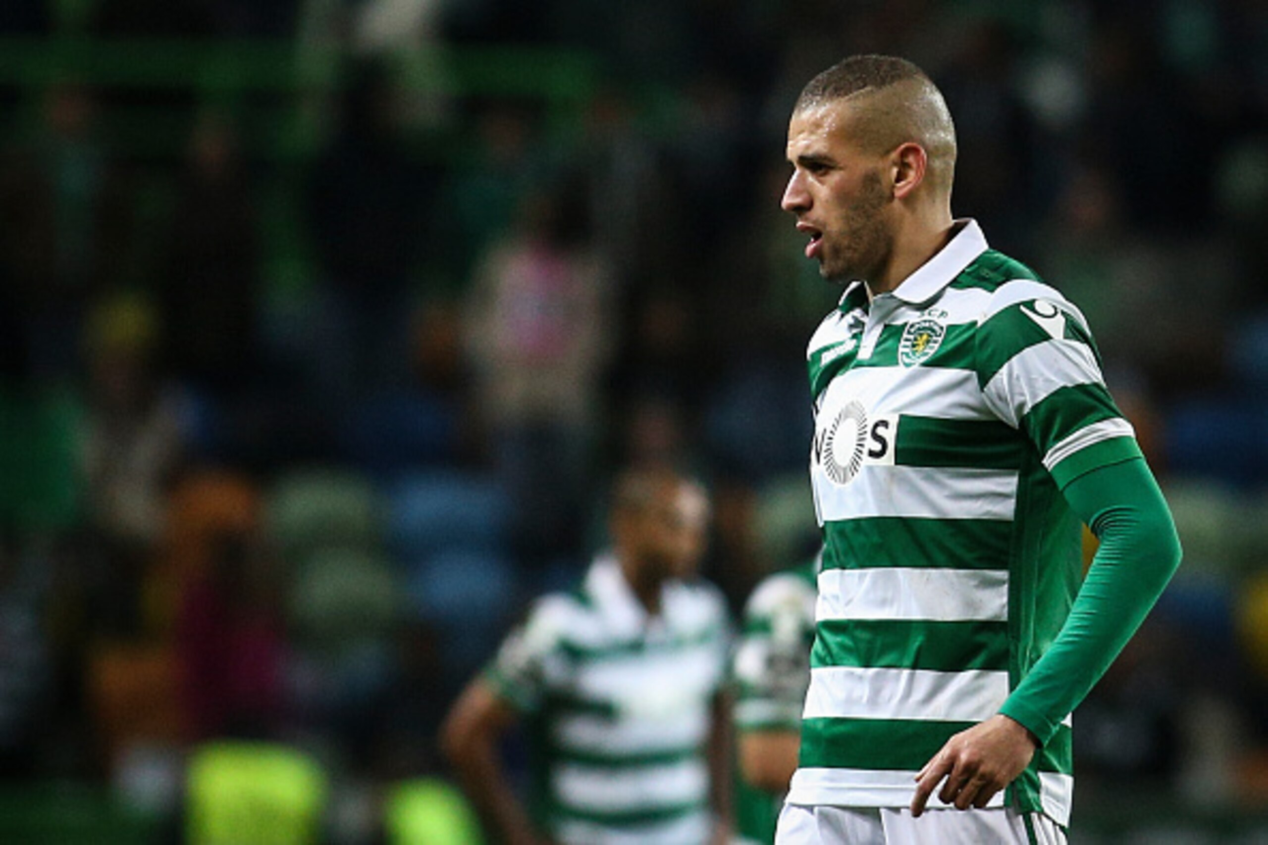 Sporting's Algerian forward Islam Slimani stands at the end of the Portuguese League football match Sporting CP vs CD Tondela at Alvalade stadium in Lisboa on January 15, 2016. The match ended with a draw 2-2. AFP PHOTO / CARLOS COSTA / AFP / CARLOS COSTA
