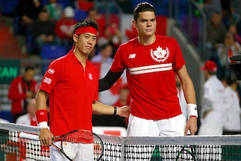 VANCOUVER, CANADA - MARCH 8:  Kei Nishikori of Japan and Milos Raonic of Canada (R) pose for a photo before their Davis Cup match March 8, 2015 in Vancouver, British Columbia, Canada. (Photo by Jeff Vinnick/Getty Images)