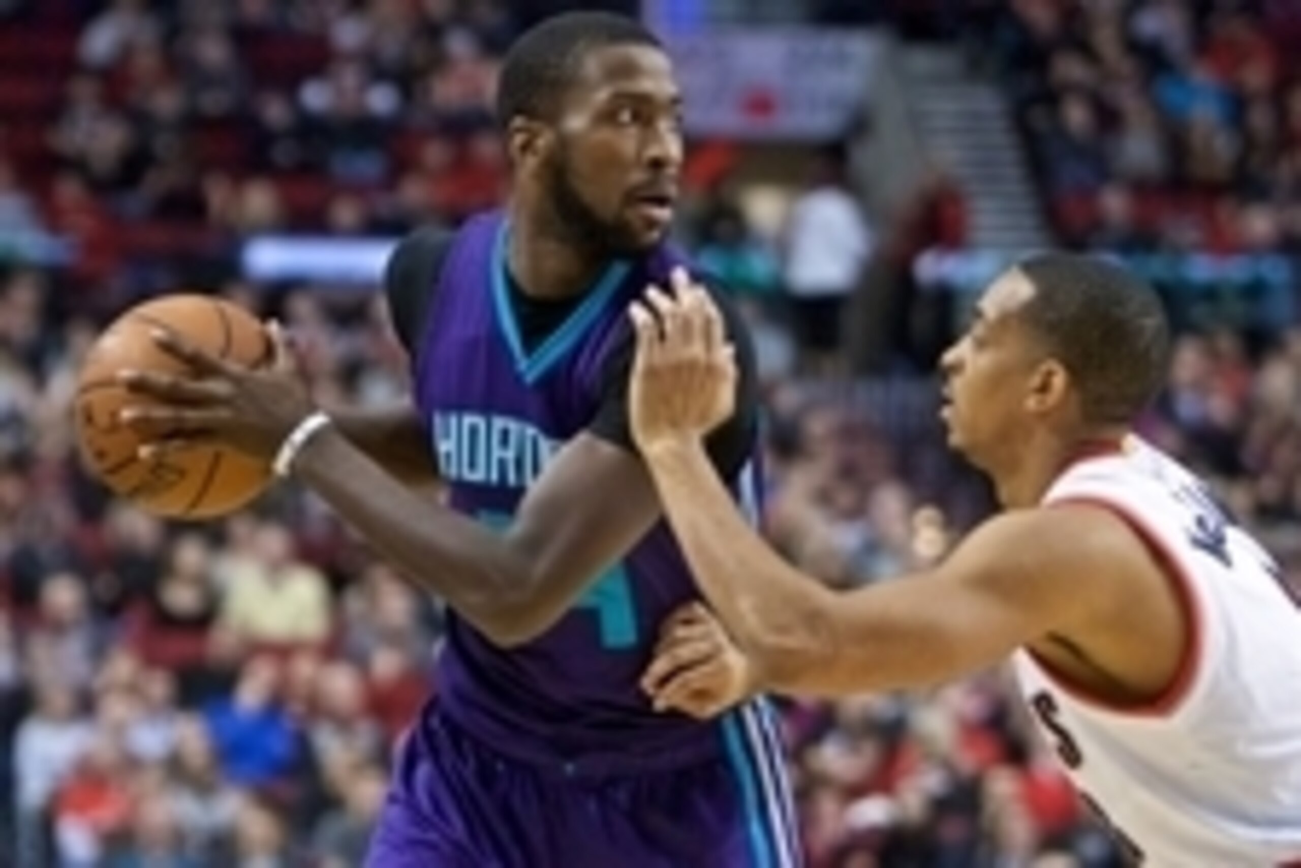 Jan 29, 2016; Portland, OR, USA; Charlotte Hornets forward Michael Kidd-Gilchrist (14) looks to pass around Portland Trail Blazers guard C.J. McCollum (3) during the first quarter at the Moda Center. Mandatory Credit: Craig Mitchelldyer-USA TODAY Sports Jan 29, 2016; Portland, OR, USA; Charlotte Hornets forward Michael Kidd-Gilchrist (14) looks to pass around Portland Trail Blazers guard C.J. McCollum (3) during the first quarter at the Moda Center. Mandatory Credit: Craig Mitchelldyer-USA TODAY Sports