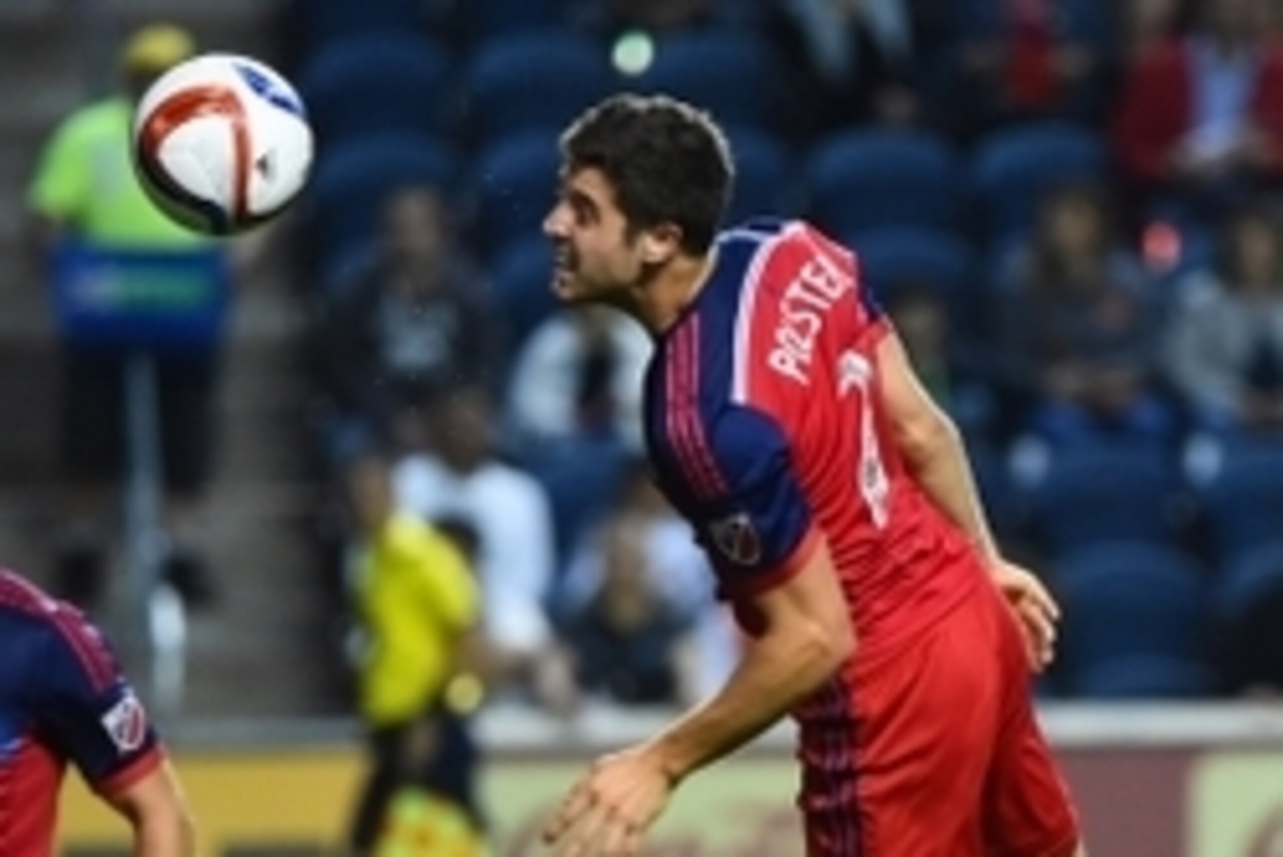 Aug 26, 2015; Chicago, IL, USA; Chicago Fire defender Matt Polster (2) heads the ball against the New York Red Bulls during the first half at Toyota Park. Mandatory Credit: Mike DiNovo-USA TODAY Sports