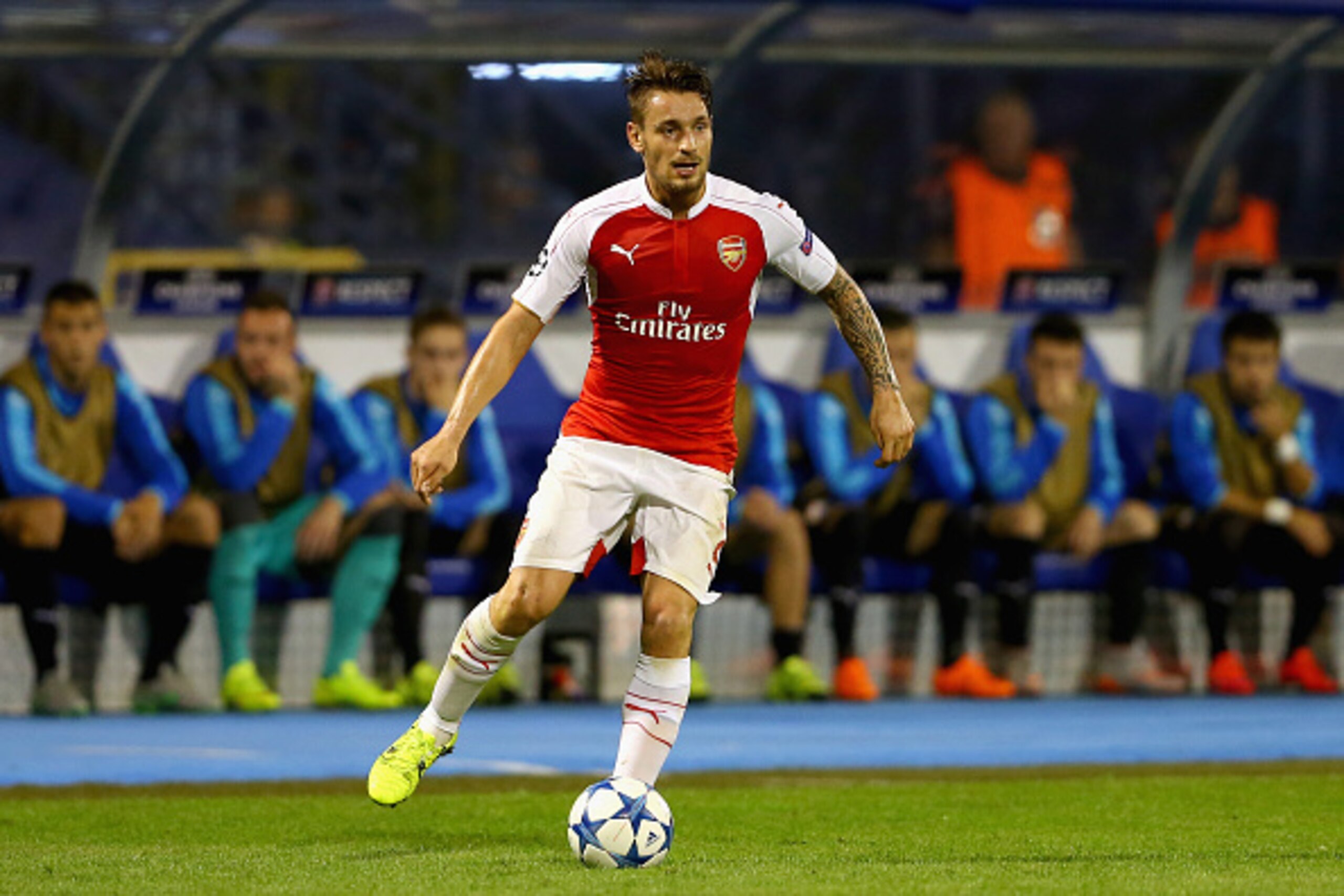 ZAGREB, CROATIA - SEPTEMBER 16:  Mathieu Debuchy of Londons runs with the ball during the UEFA Champions League Group F match between Dinamo Zagreb and Arsenal at Maksimir Stadium on September 16, 2015 in Zagreb, Croatia.  (Photo by Alexander Hassenstein/