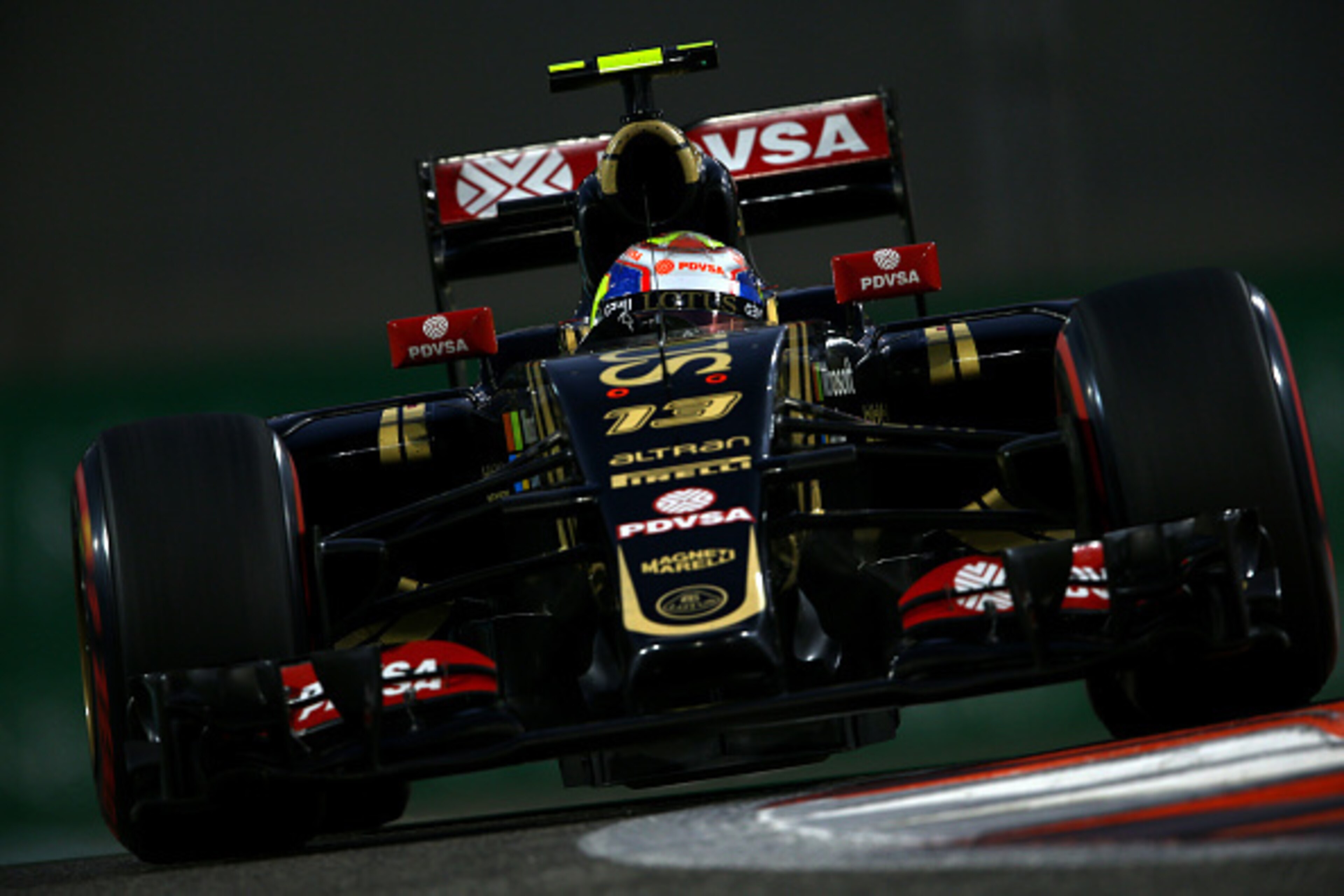 ABU DHABI, UNITED ARAB EMIRATES - NOVEMBER 28:  Pastor Maldonado of Venezuela and Lotus drives during qualifying for the Abu Dhabi Formula One Grand Prix at Yas Marina Circuit on November 28, 2015 in Abu Dhabi, United Arab Emirates.  (Photo by Paul Gilham
