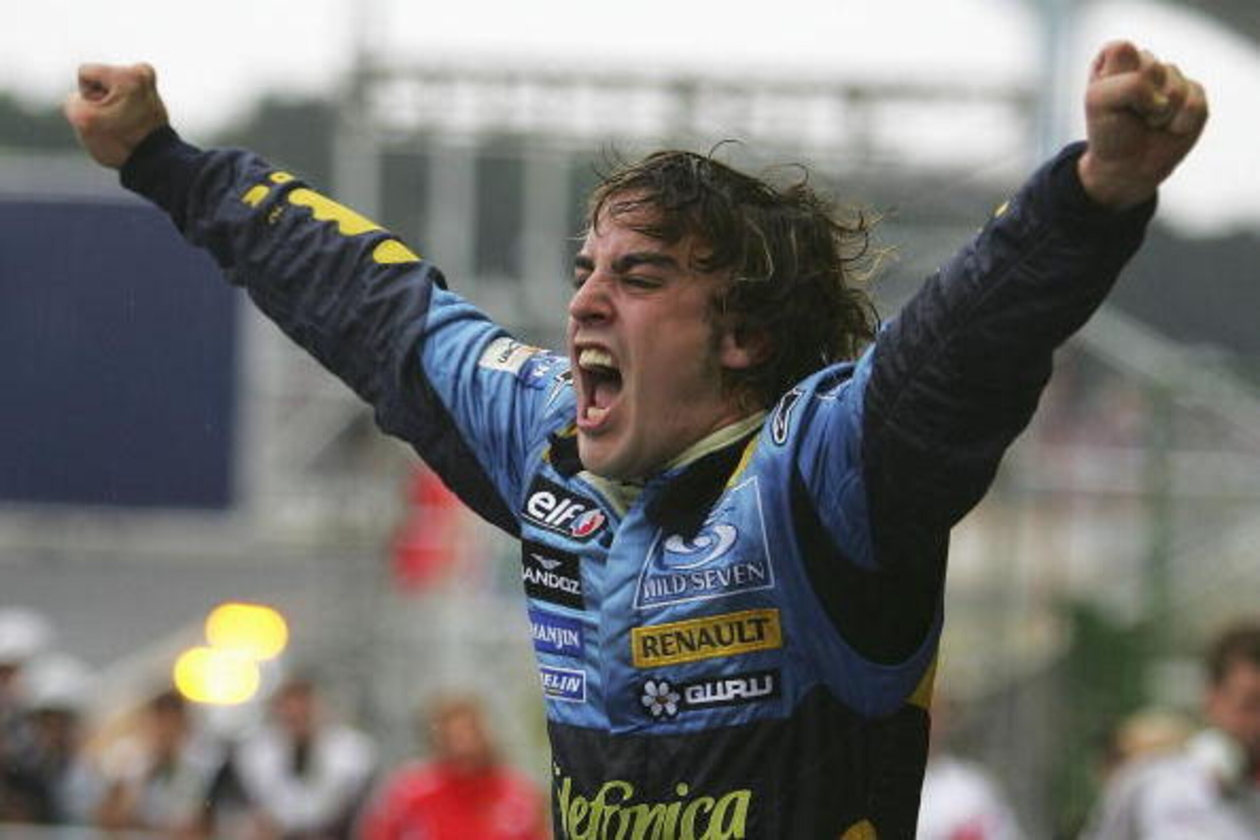 SAO PAULO, BRAZIL - SEPTEMBER 25:  Fernando Alonso of Spain and Renault celebrates winning the World Championship after finishing third in the Brazilian F1 Grand Prix at the Autodromo Interlagos on September 25, 2005 in Sao Paulo, Brazil.  (Photo by Clive